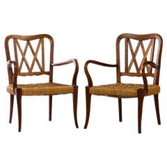 Pareja de sillones de roble y cuerda, obra francesa circa 1950