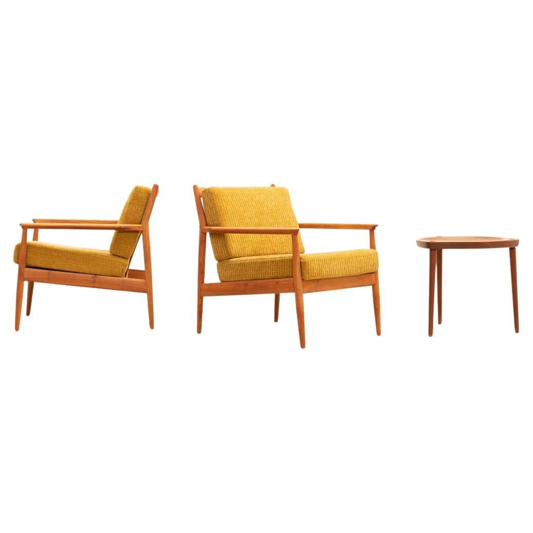 Coppia di poltrone in teak in vendita