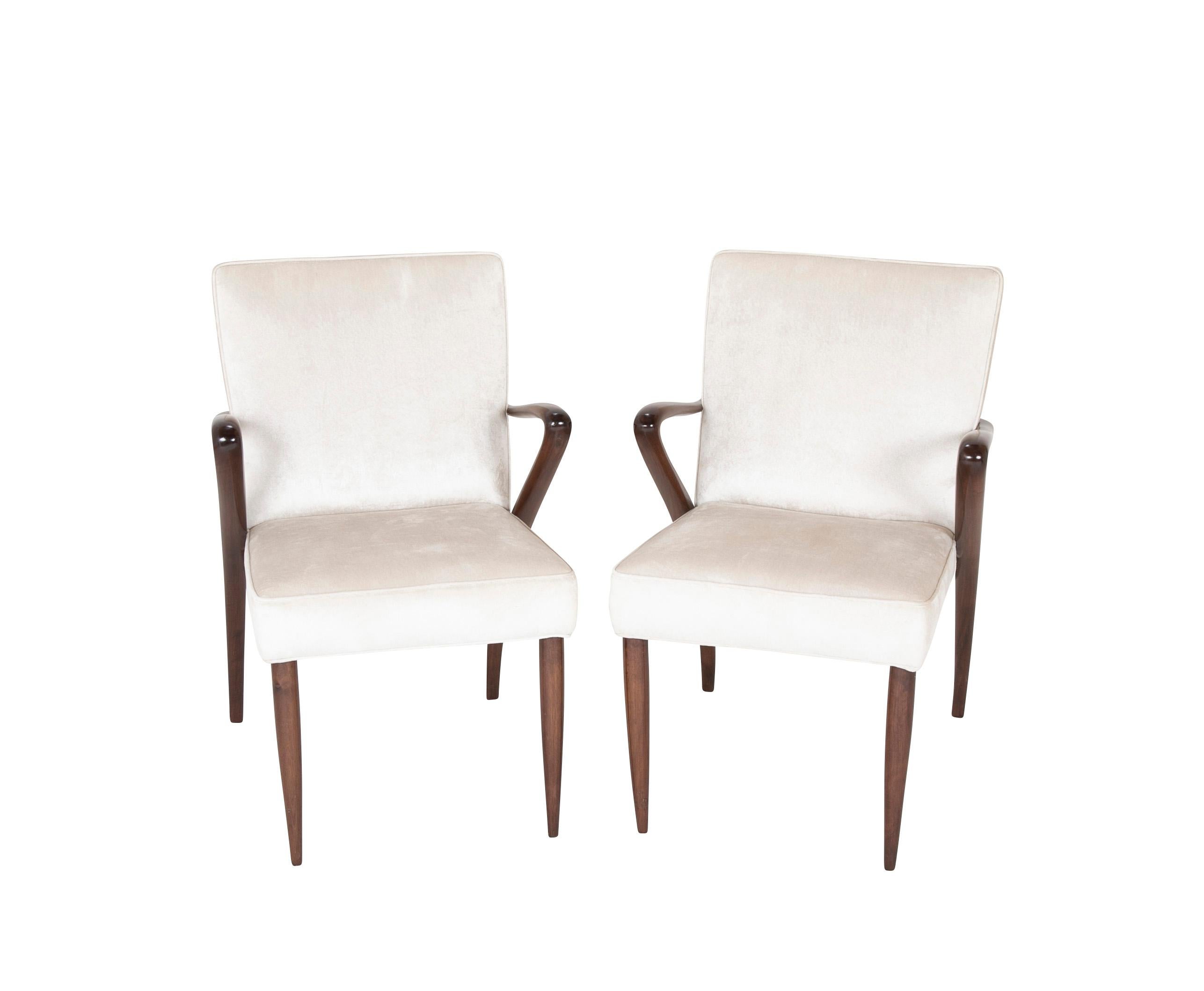Pair of armchairs in the manner of Osvaldo Borsani, (Italy, 1911-1985).
