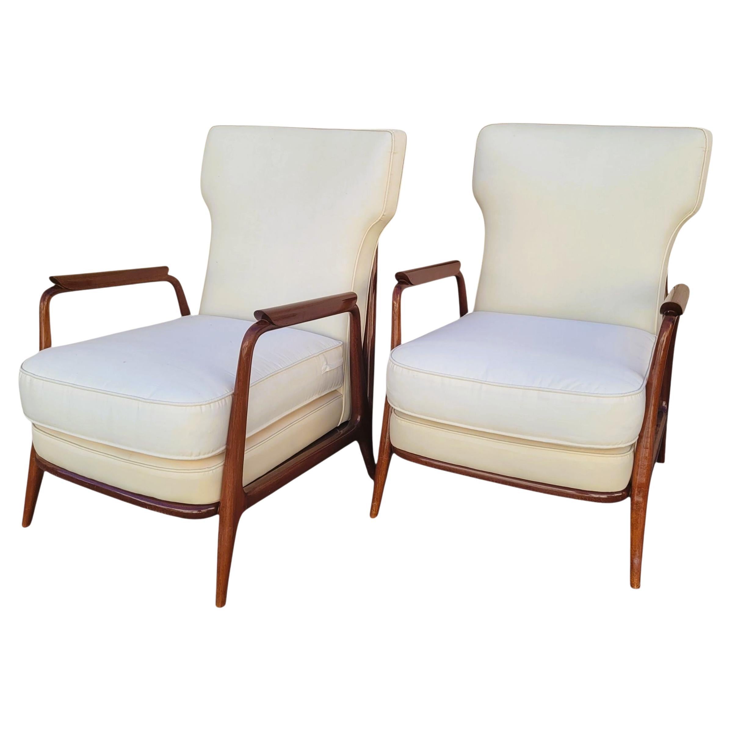 Coppia di poltrone nello stile di G Scapinelli, fine XX secolo