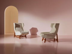 Pair of armchairs in the style of Gianfranco Frattini, Italy, 1950s