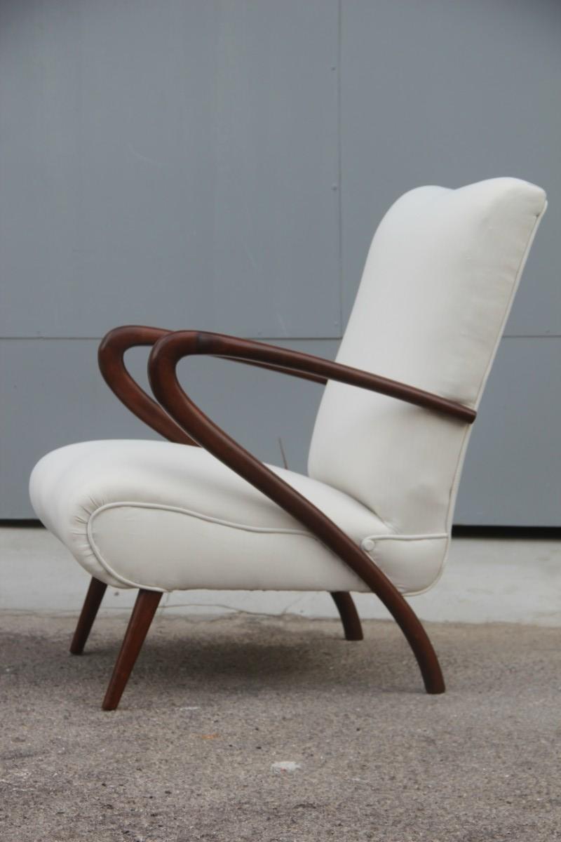 Minimal and chic Italian design armchairs 1950s original design, truly unique and unique wood movement, elegance and refinement will make the protagonists in your furniture.