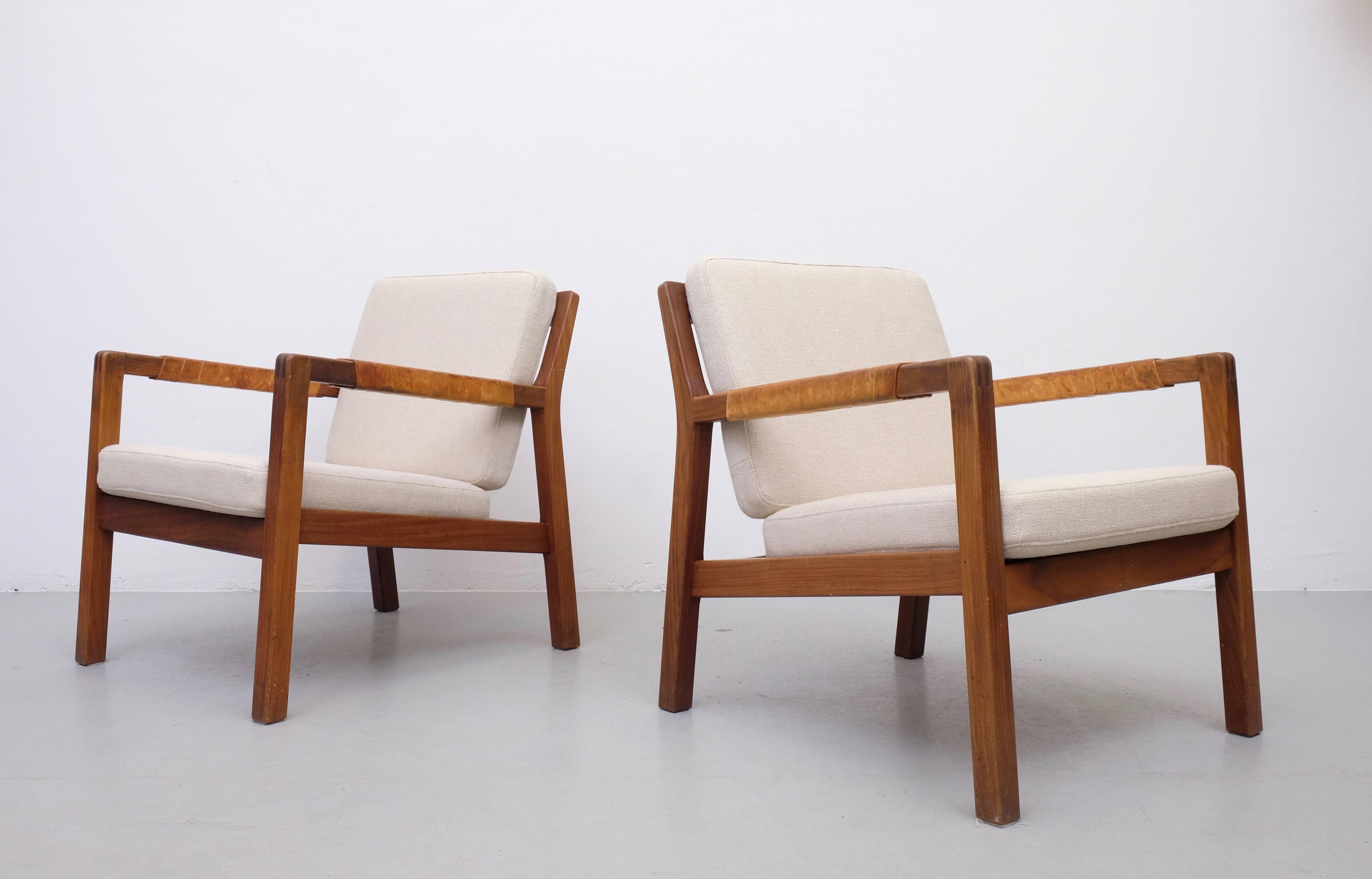 Rare armchairs model Rialto by Carl Gustav Hiort af Ornäs, Finland, 1950s.
Teak, leather covered armrests, back with braided leather straps, loose cushions reupholstered in Kvadrat fabric.

 