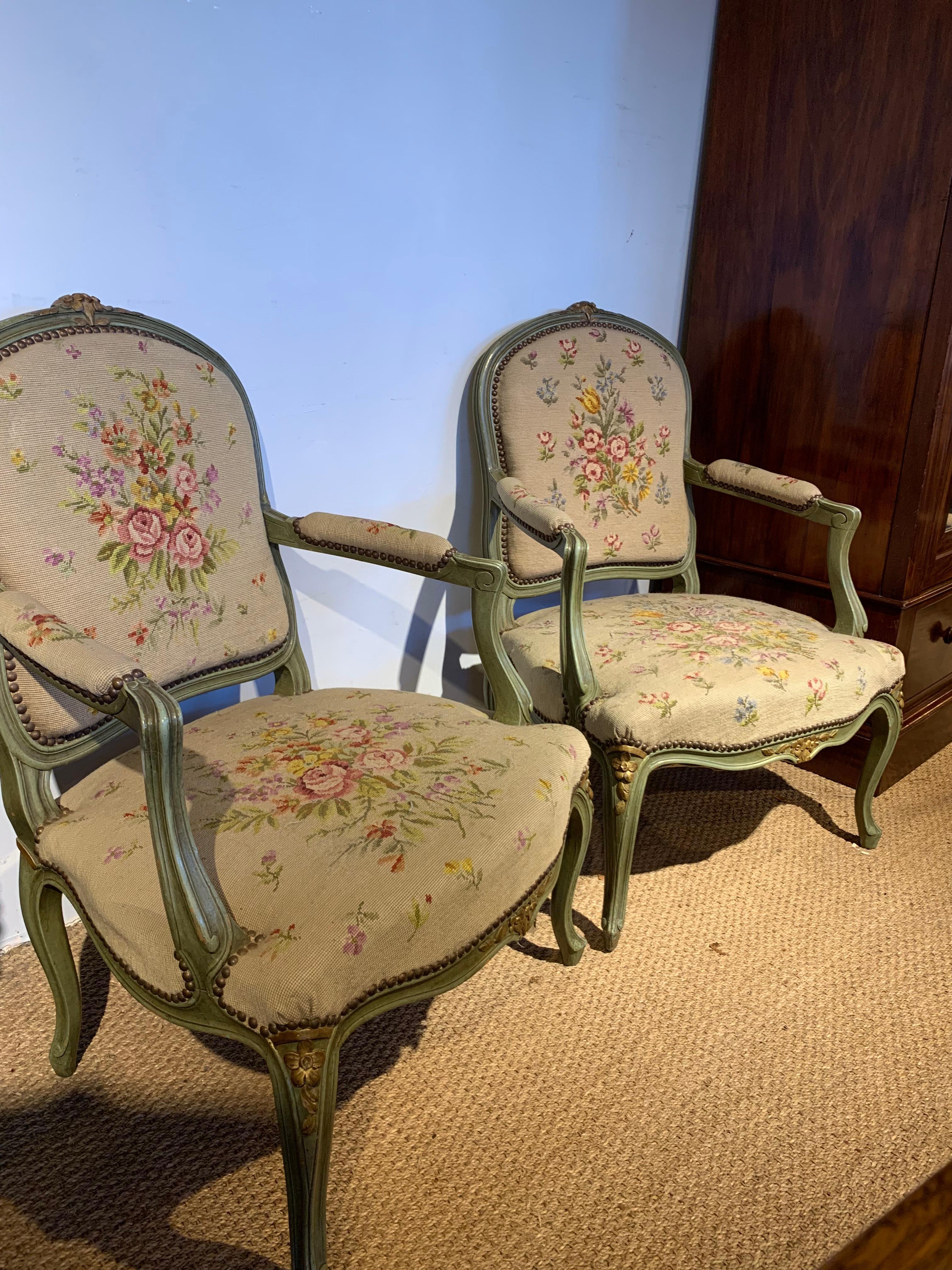 Great pair of early 20th century Louis XV style Fauteils nice wide seats 

French dating to circa 1910, with original tapestry fabric 

Measures: Height 38 inches
Width 26 inches
Depth 27 inches.