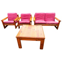 Pair of armchairs, sofa and pine table