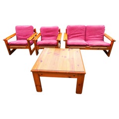 Pair of armchairs, sofa and pine table