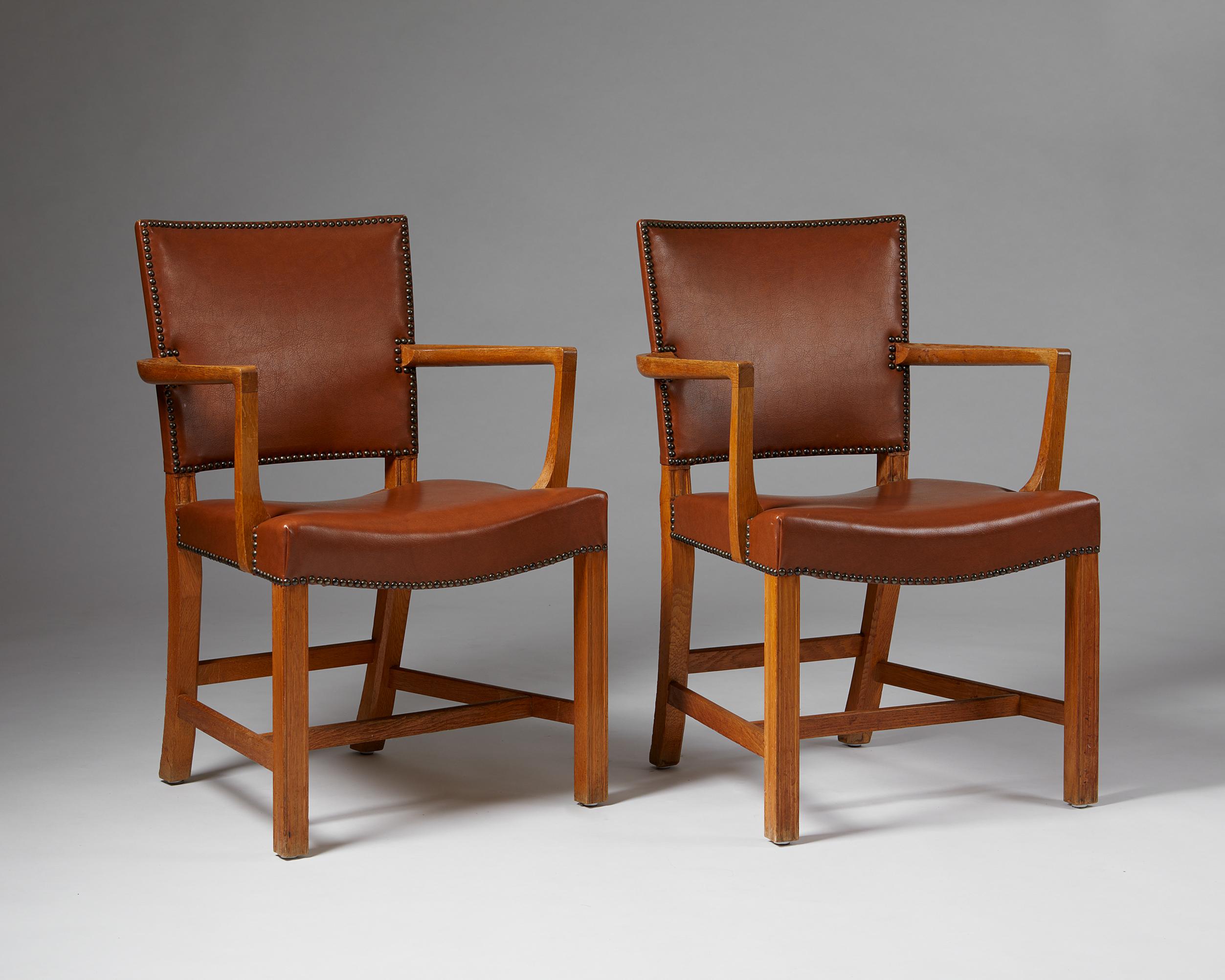 Pair of armchairs “The Red Chair” designed by Kaare Klint for Rud. Rasmussen,

Denmark, 1930.

Oak, leather upholstery and brass.

Stamped ‘RUD. RASMUSSENS SNEDKERIER 45 NORREBROGADE KOBENHAVN’
Literature: Gorm Harkær, Klintiana: “Kaare Klint”, vol.