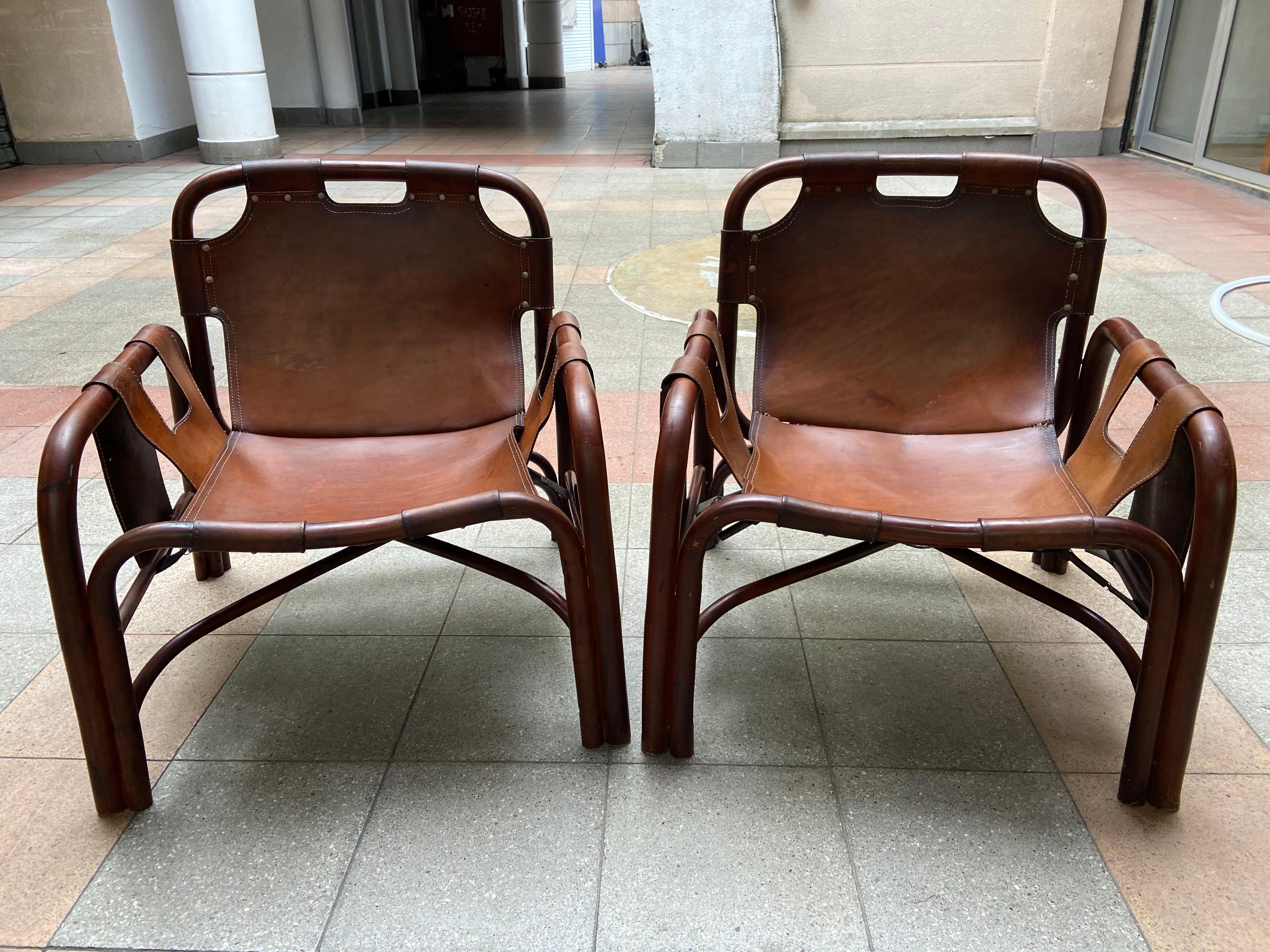 Pair of armchairs - Tito Agnoli
Bamboo and leather 
Bonacina Edition 
Measures: L 268 x W 72 x H 70 cm
circa 1960 
3400 Euros.