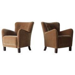 Coppia di poltrone, imbottite in puro mohair