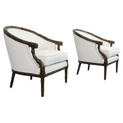 Pair of armchairs with carved bamboo-like frames and burl lacquered wood -