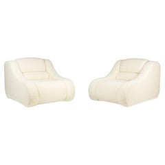 Pair of armchairs with fine curls. Contemporary work.