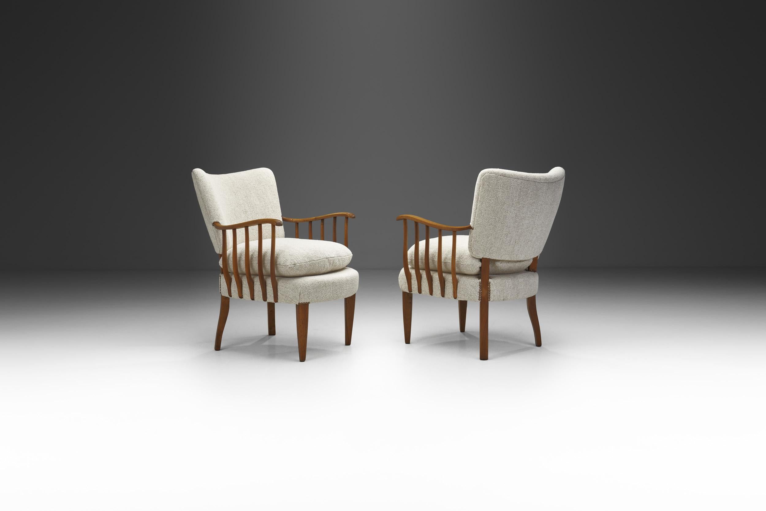 Like this pair of sculptural armchairs, European cabinetmakers’ seating creations are generally characterized by clarity in design and extremely high quality craftsmanship and choice of materials.

Designers in the post-war period focused on