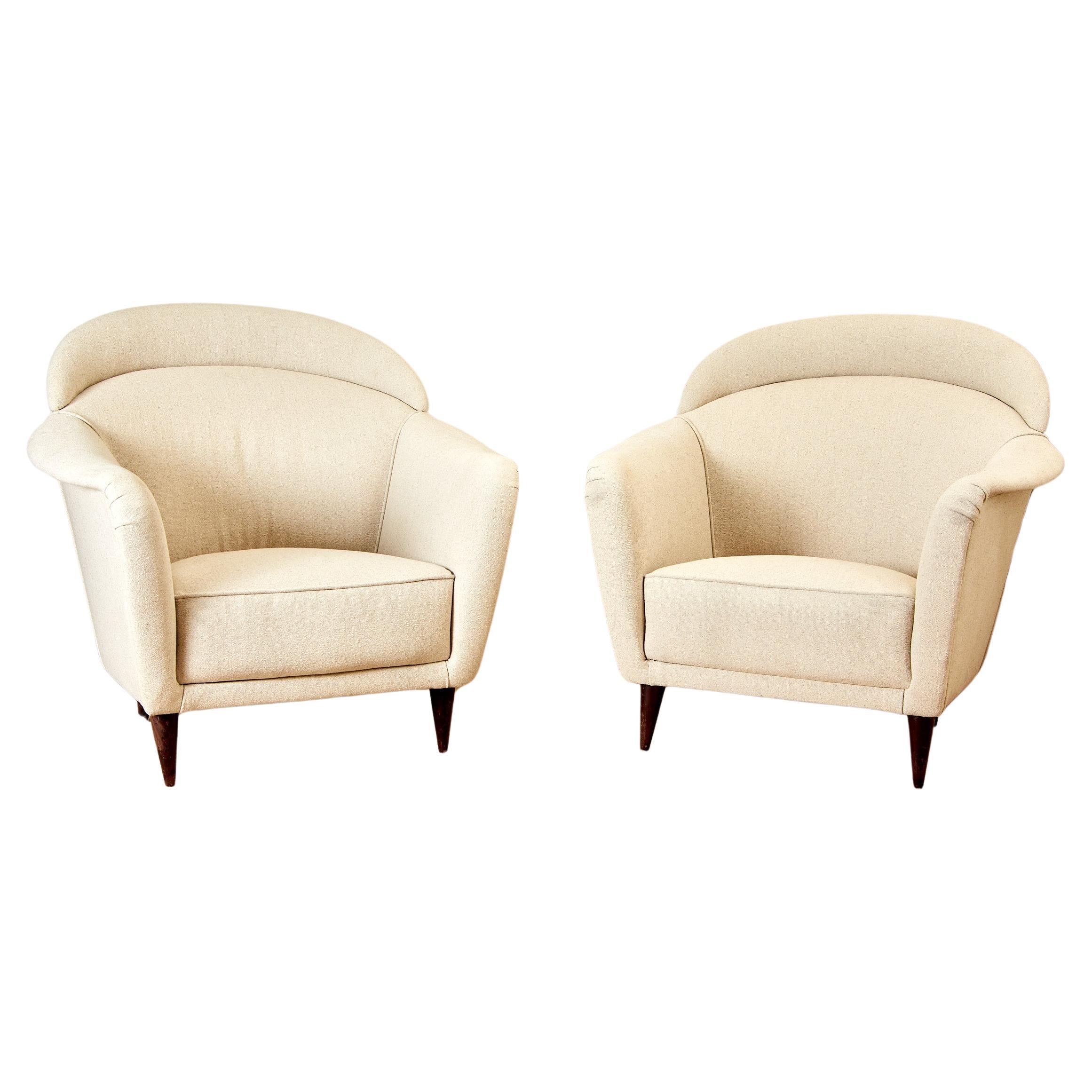 Pair of armchairs, wood and cotton, circa 1970, Italy.