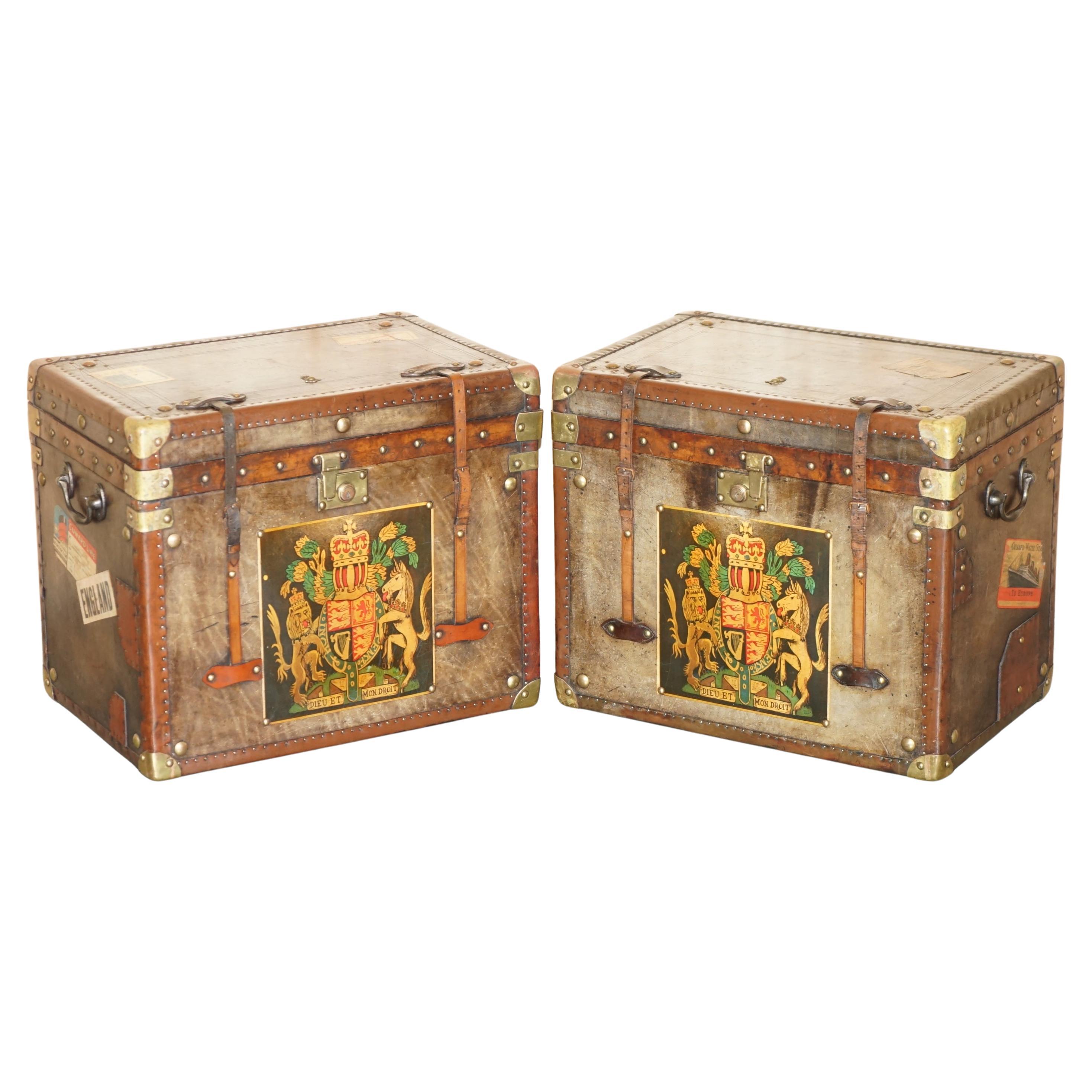 PAIR OF ARMORIAL COAT OF ARMS VINTAGE BROWN LEATHER STEAMER TRUNK SIDE TABLEs For Sale
