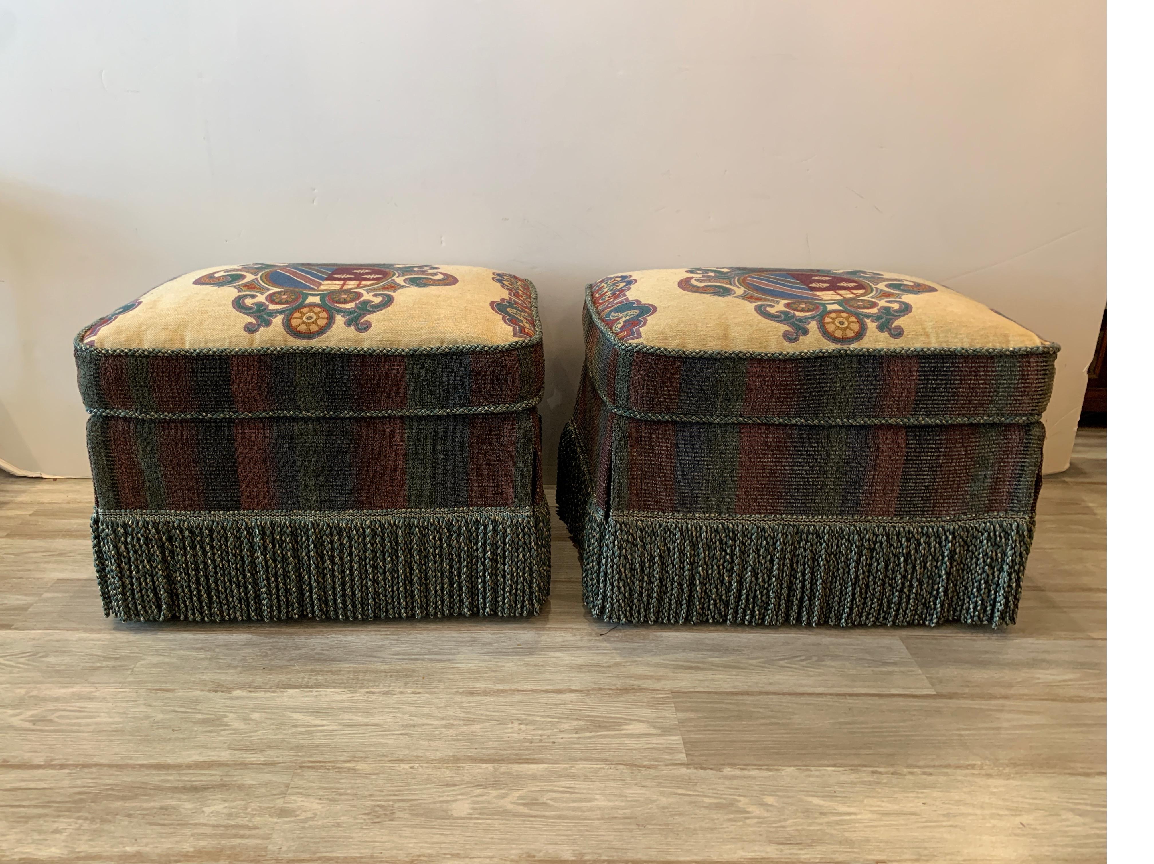 American Pair of Armorial Upholstered Ottomans with Bouillon Fringe