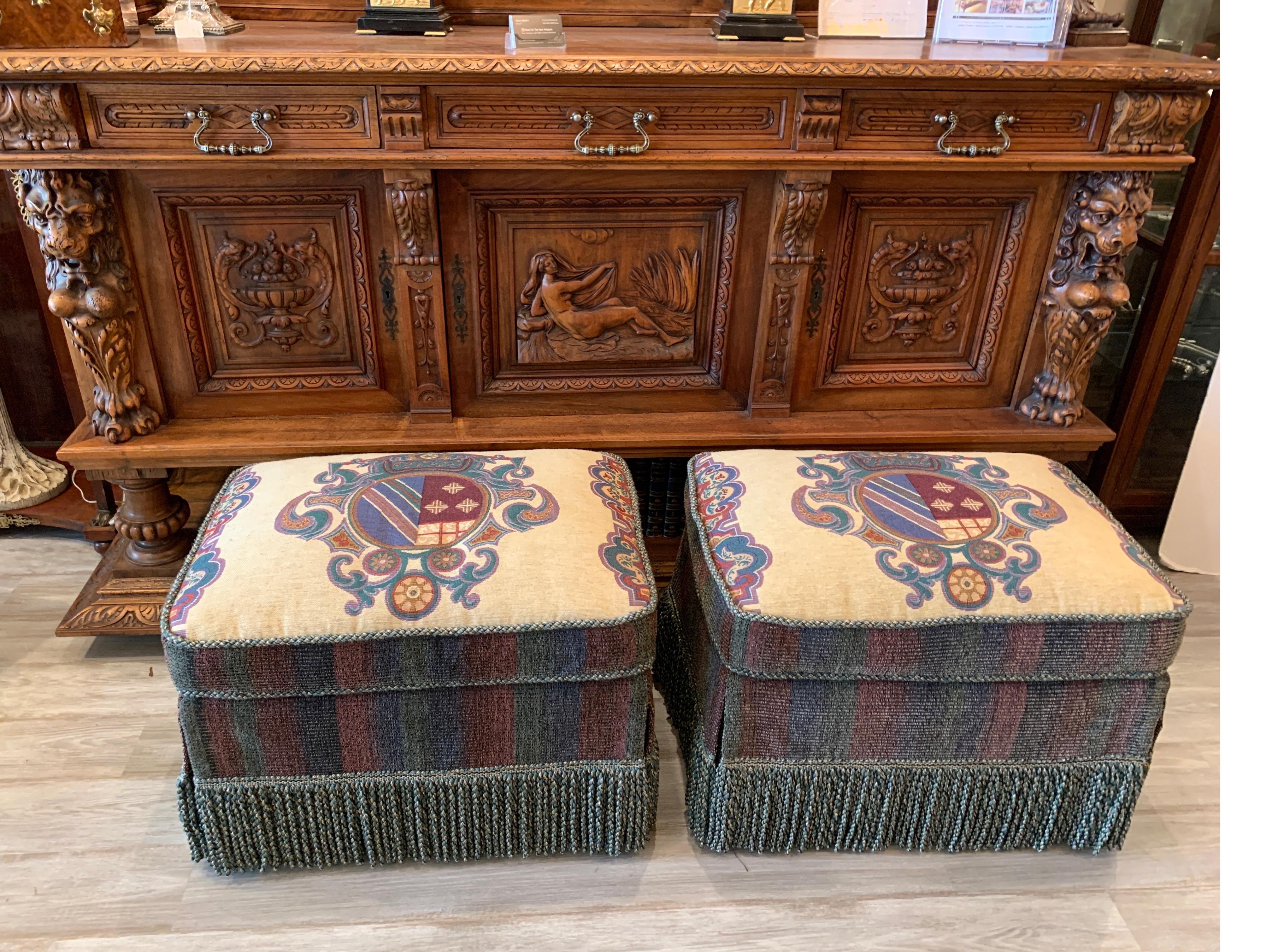 20th Century Pair of Armorial Upholstered Ottomans with Bouillon Fringe