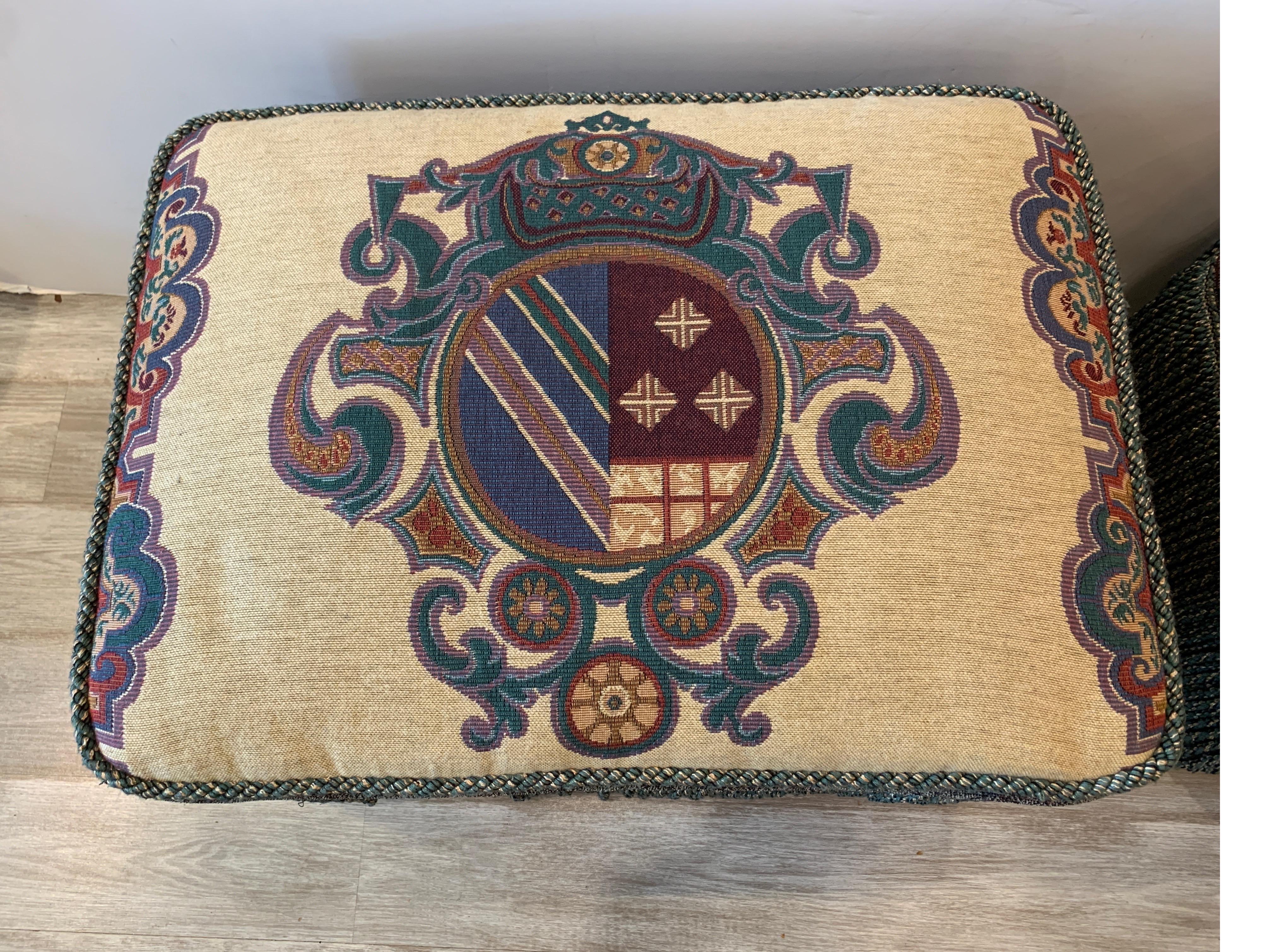 Fabric Pair of Armorial Upholstered Ottomans with Bouillon Fringe