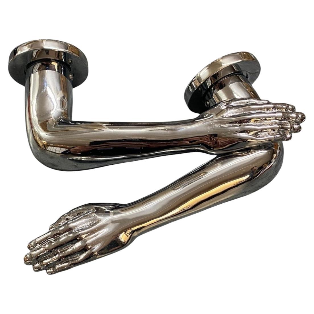 Pair Of Arms Door Handles by Quintana Partners