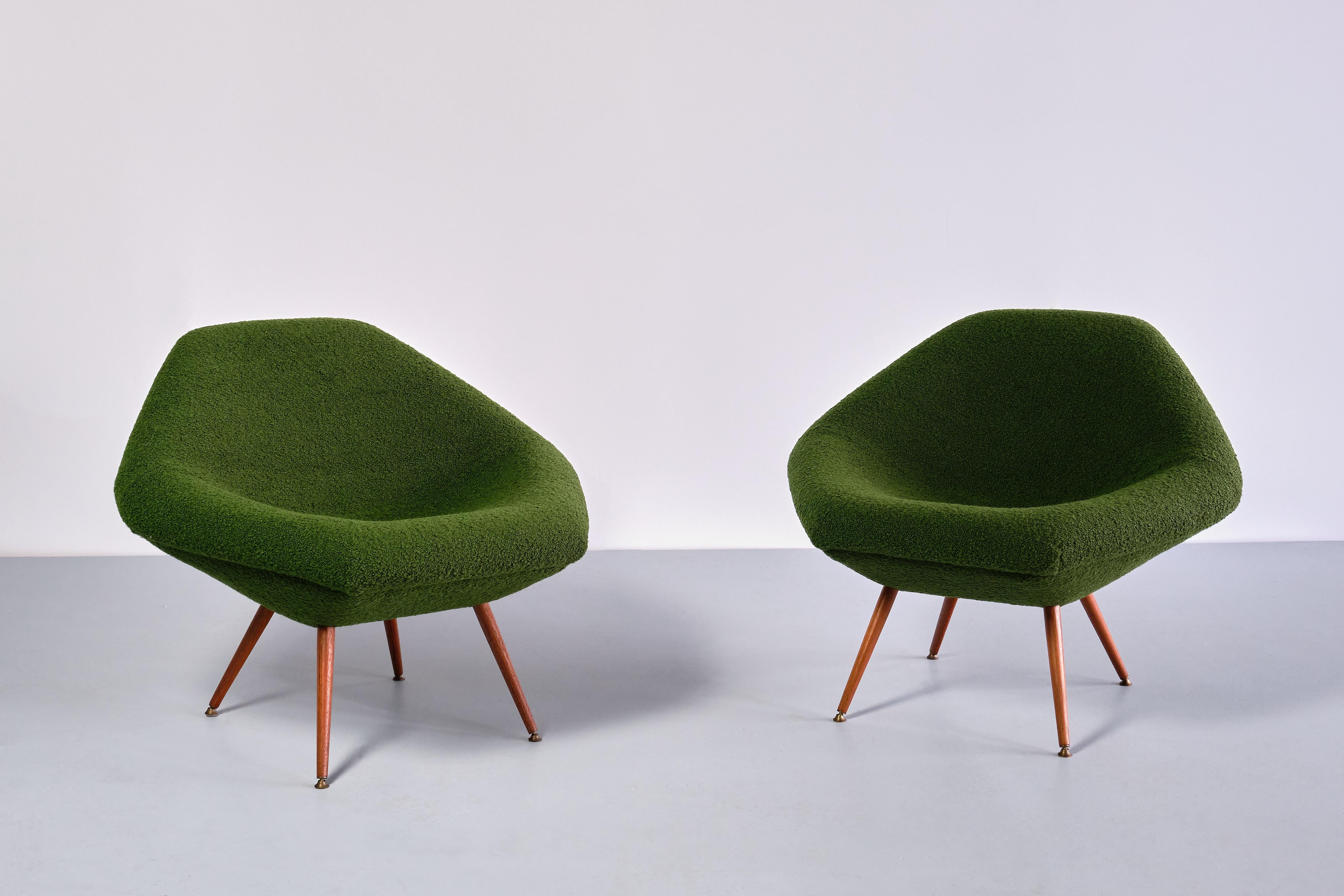 This rare pair of lounge chairs was designed by Arne Dahlén in the early 1960s. The model was called 'Eva' and was manufactured by his company, Dahléns Company in the Swedish town Dalum. The company was solely devoted to the production of chairs. 