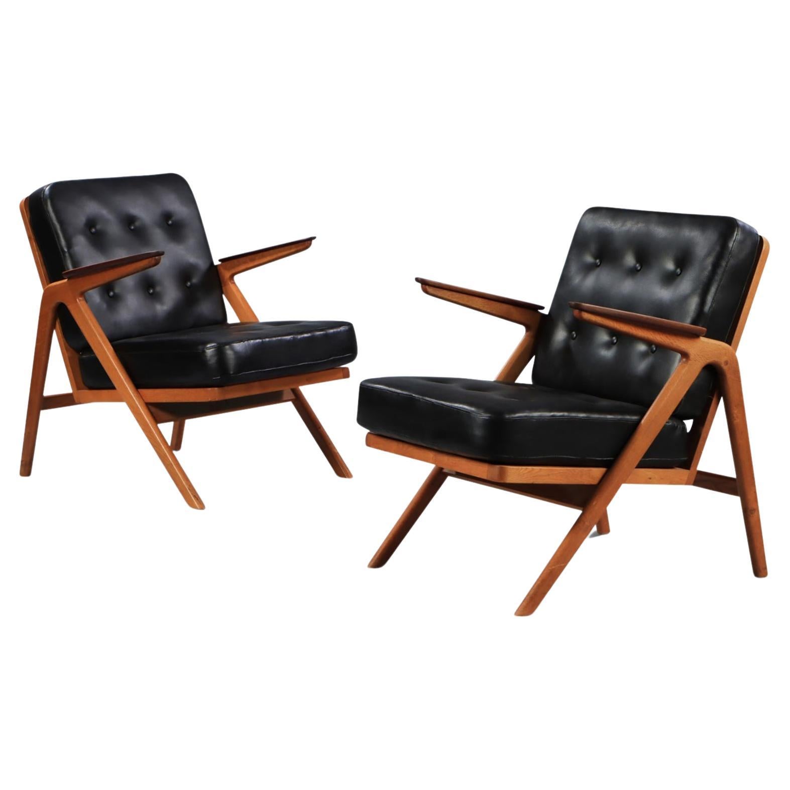 Pair of Arne Hovmand Olsen Lounge Chairs in Teak + Oak