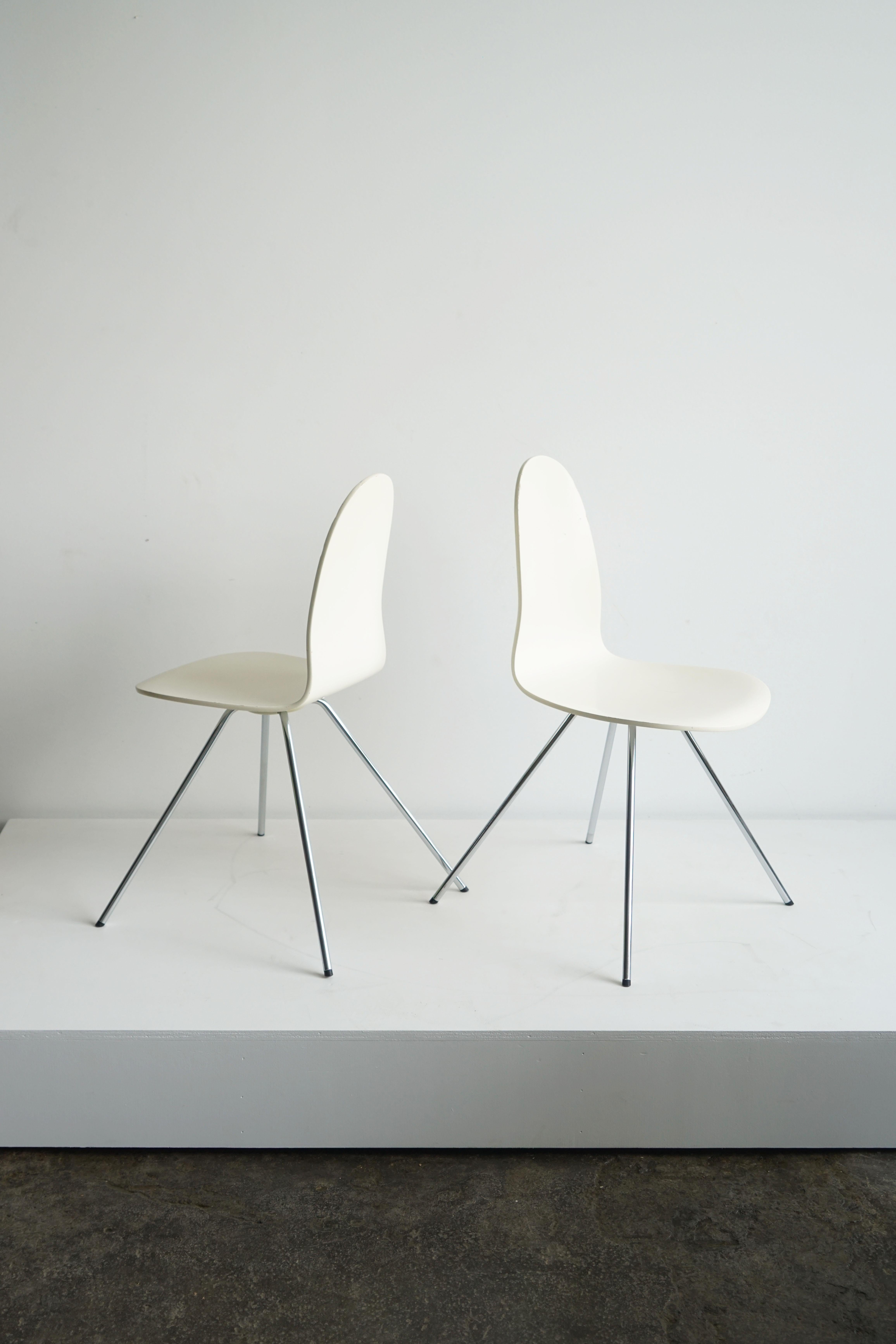 Pair of Arne Jacobsen Tongue chairs model 3106
Fritz Hansen
Denmark, circa 1965

Lacquered plywood seats, chrome-plated legs
31 h × 19 w × 18 d in

Condition:
Overall good vintage condition. Scattered scuffs, scratches, and wear from age and use,