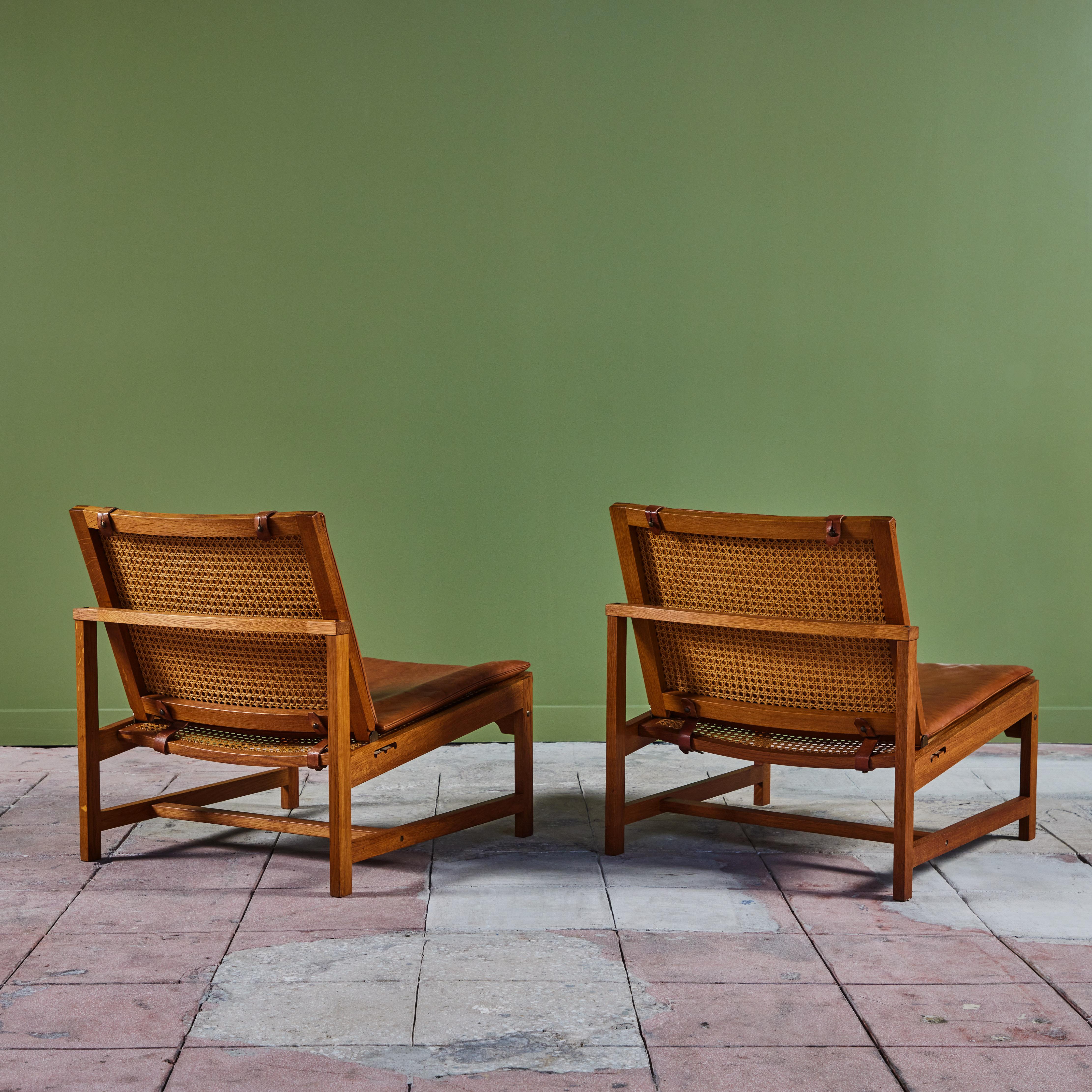 Pair of Arne Karlsen and Peter Hjort Leather and Cane Lounge Chairs 5