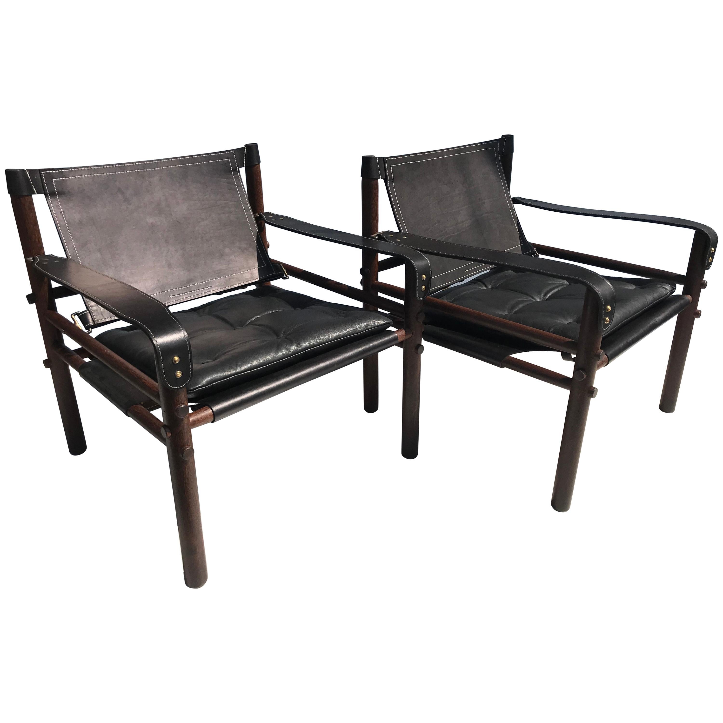 Pair of Arne Norell Black "Sirocco" Safari Chairs