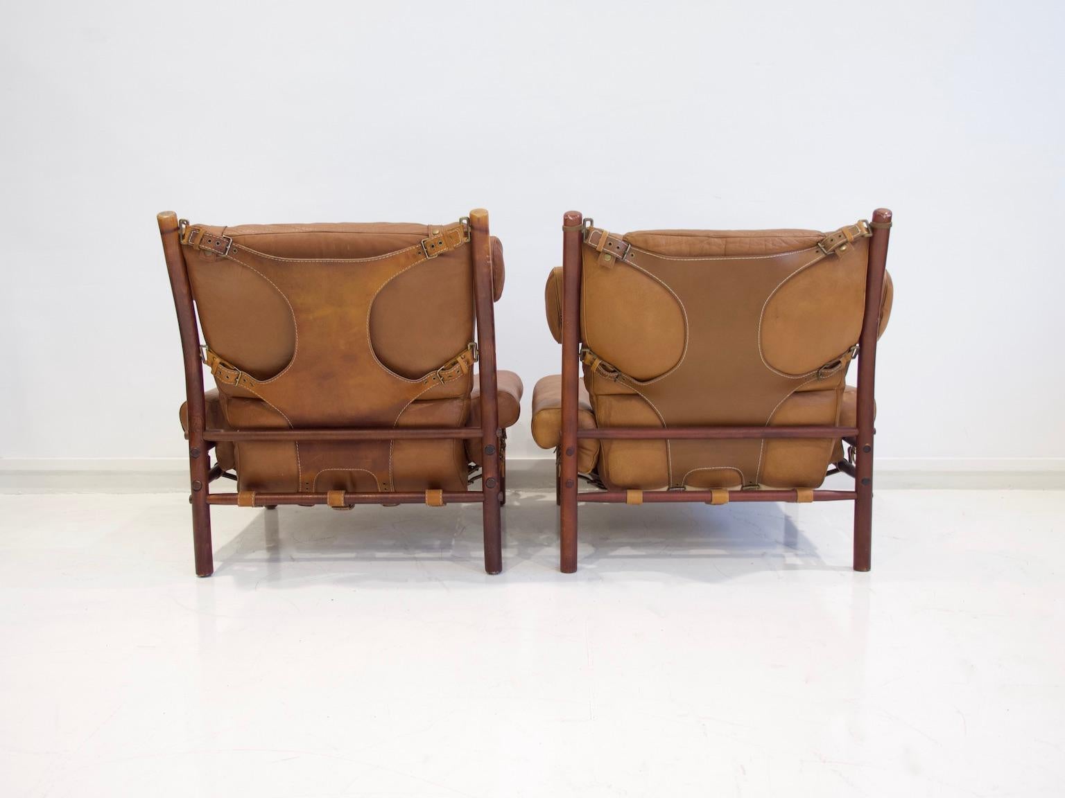 Stained Pair of Arne Norell Brown Leather Inca Lounge Chairs