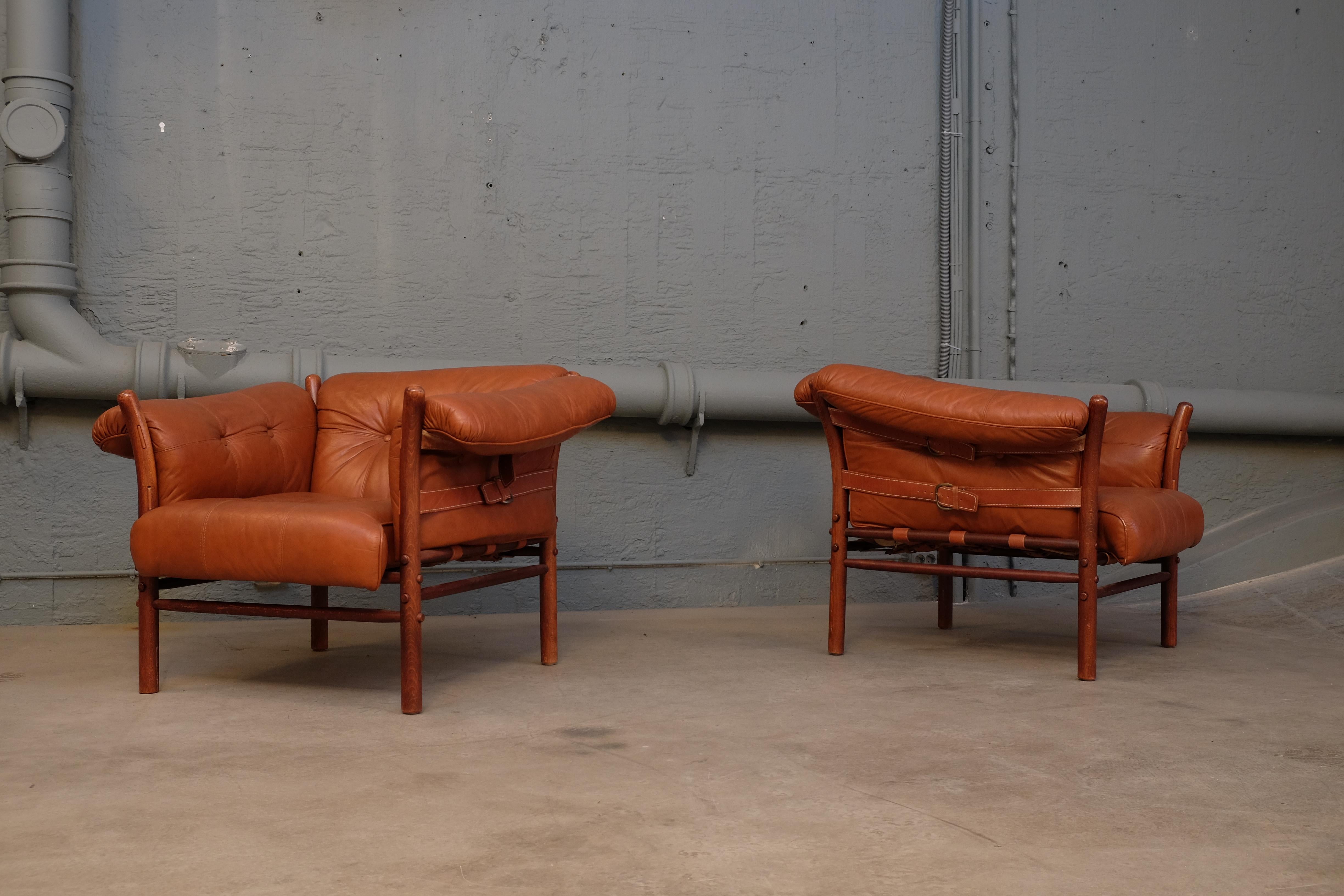 A pair of Ilona easy chairs in patinated original buffalo rusty brown leather.
Designed by Arne Norell, produced by Norell Möbel AB in Aneby, Sweden. Signed.
Excellent condition with minor signs of usage.





 