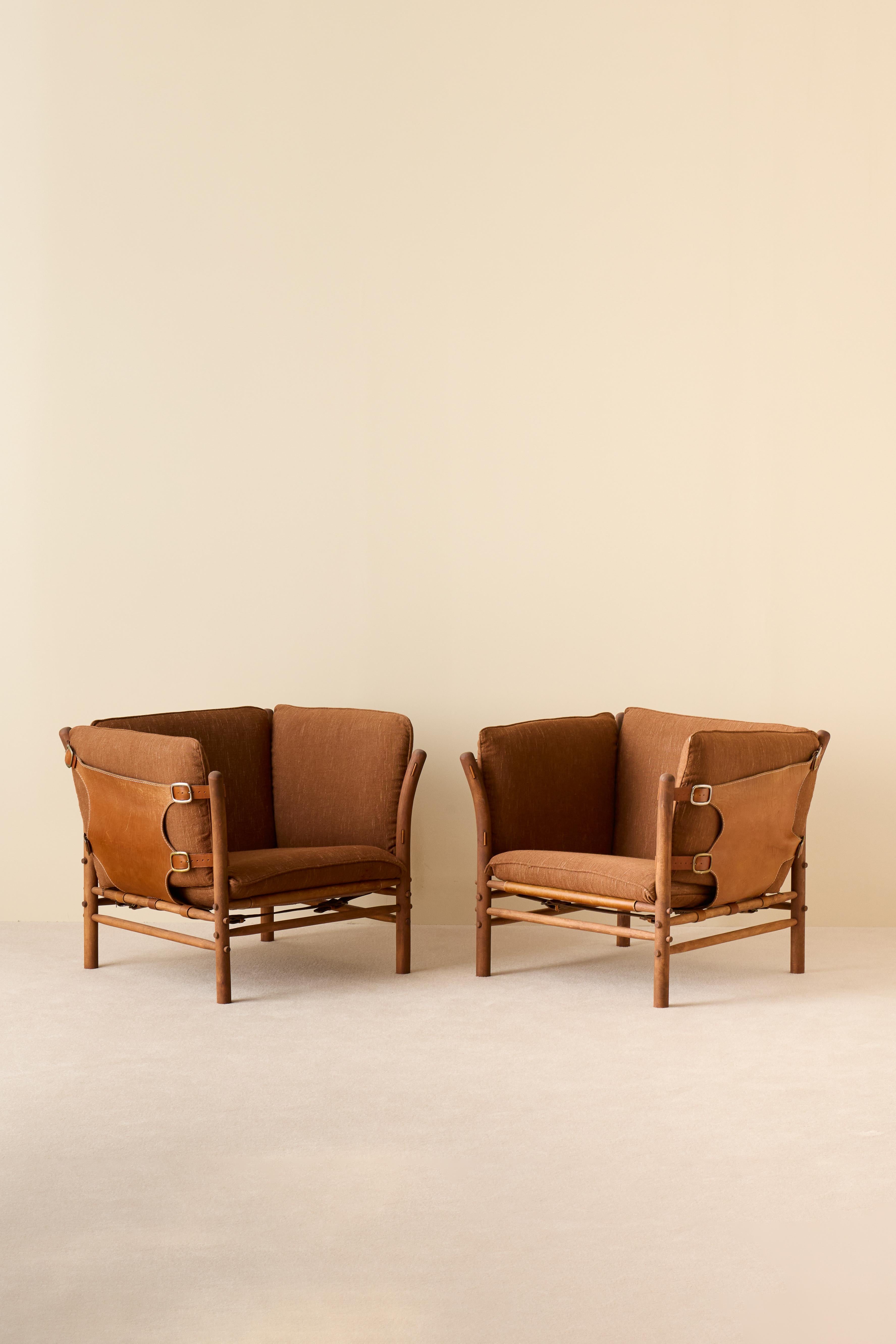Poltrone Ilona con pelle marrone originale. 
Disegnato da Arne Norell, prodotto da Arne Norell AB ad Aneby, Svezia, anni '1970.