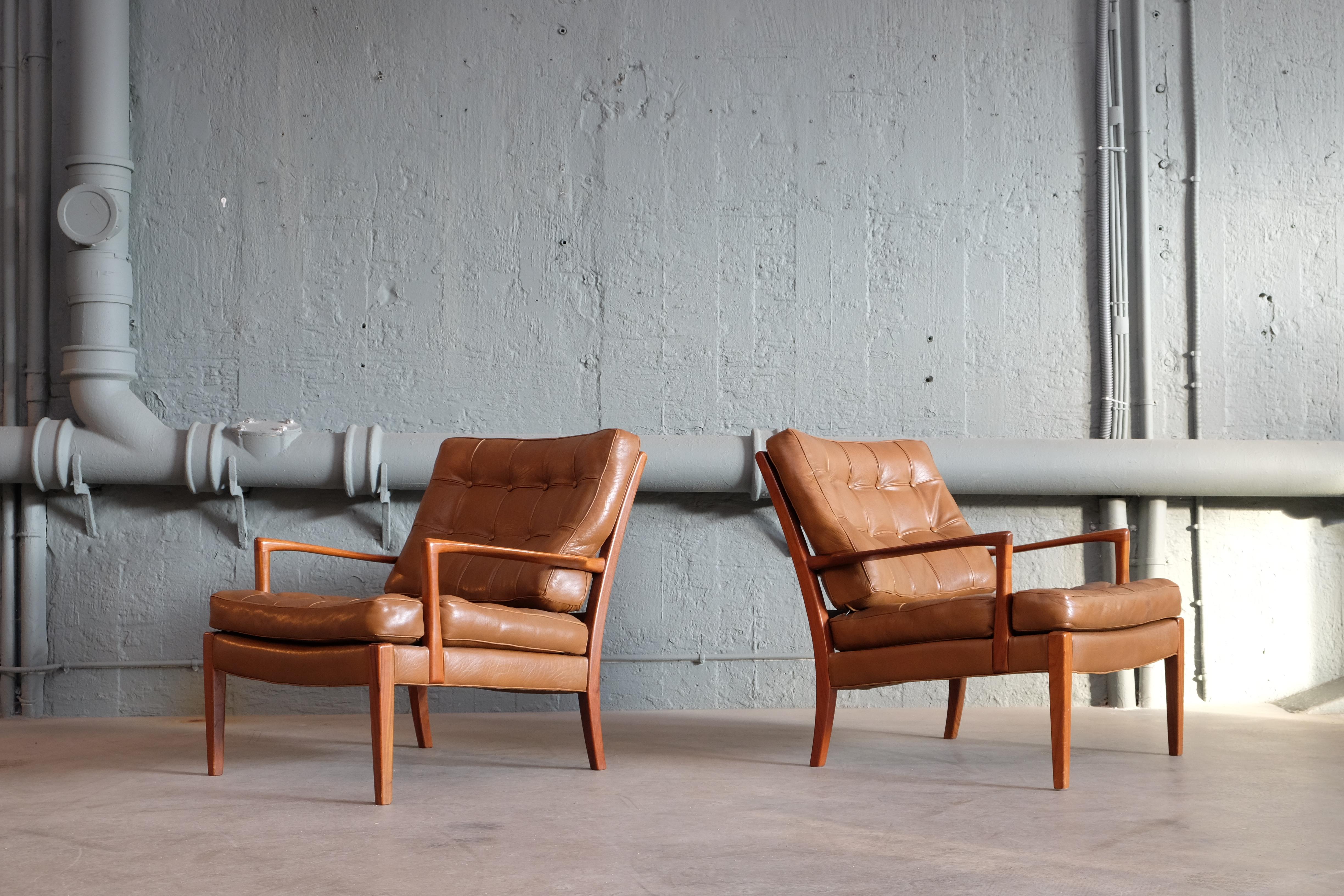 Easy chairs model Löven designed by Arne Norell. Produced by Arne Norell AB in Aneby, Sweden, 1960s.
Original leather.