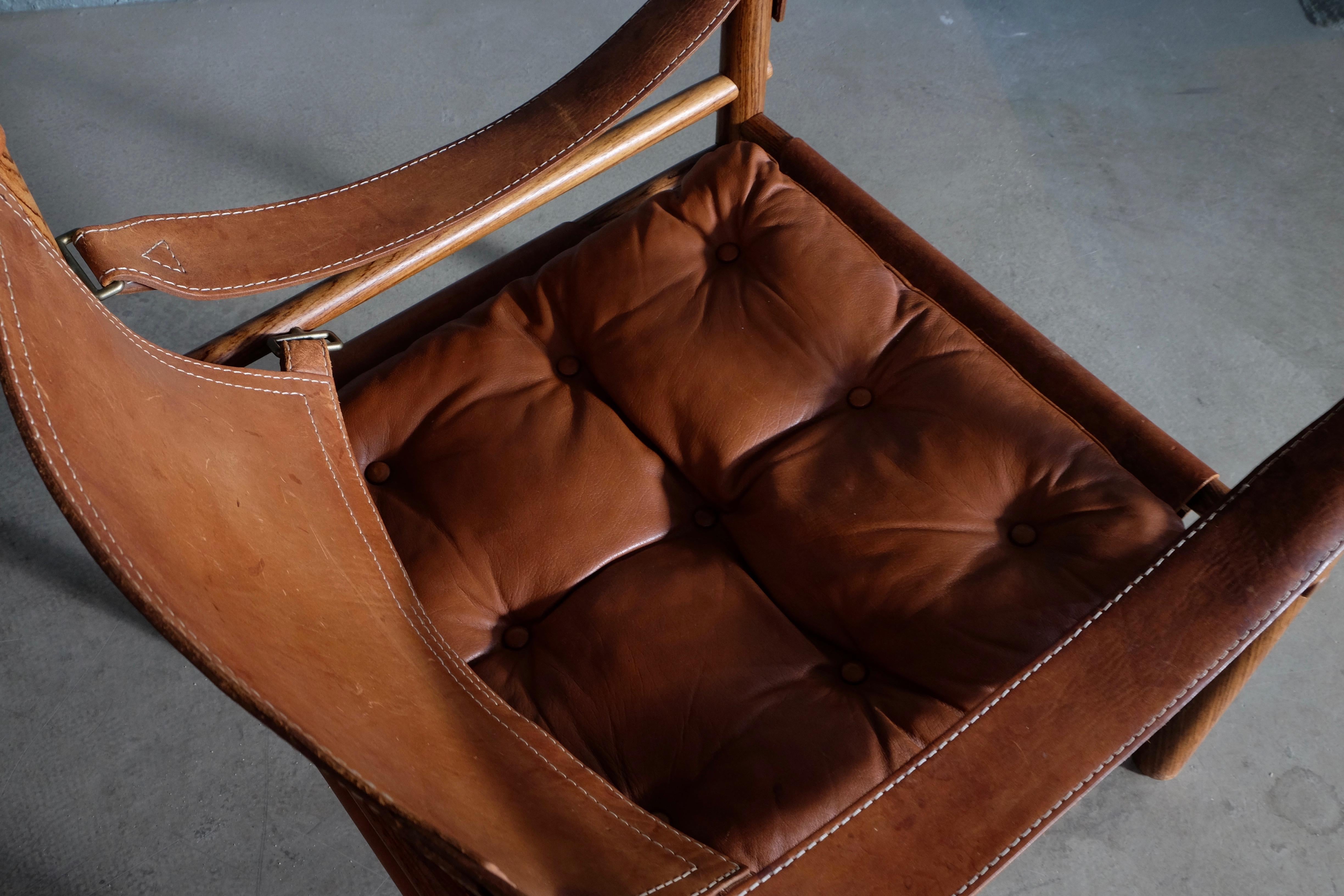 Excellent pair of safari chairs model Sirocco in very good condition. Cognac original brown leather.
Designed by Arne Norell, produced by Arne Norell AB in Aneby, Sweden, 1960s. Signed.




    