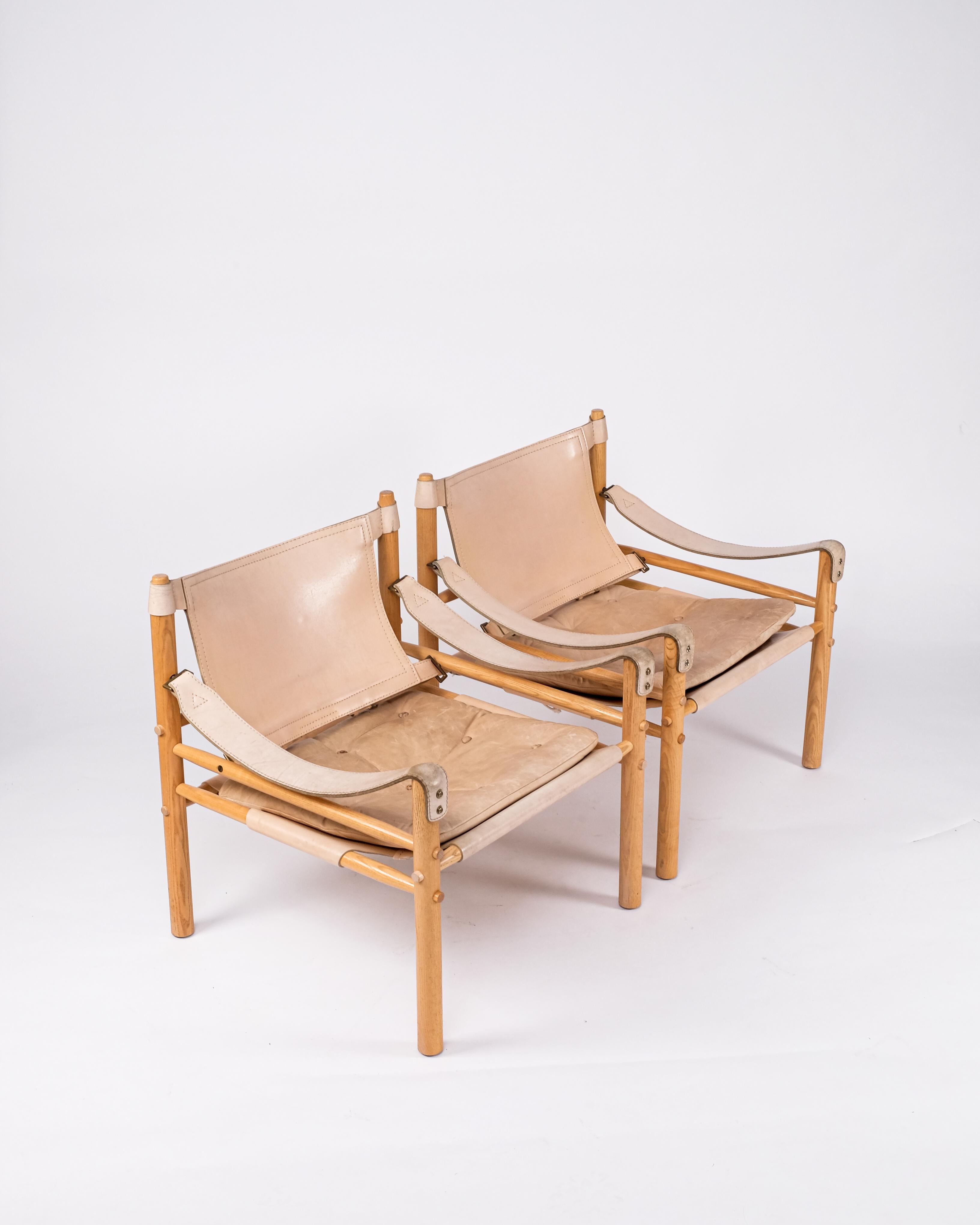 Excellent pair of safari chairs model Sirocco in good condition.
Original leather. Designed by Arne Norell, produced by Arne Norell AB in Aneby, Sweden, 1970s.





 