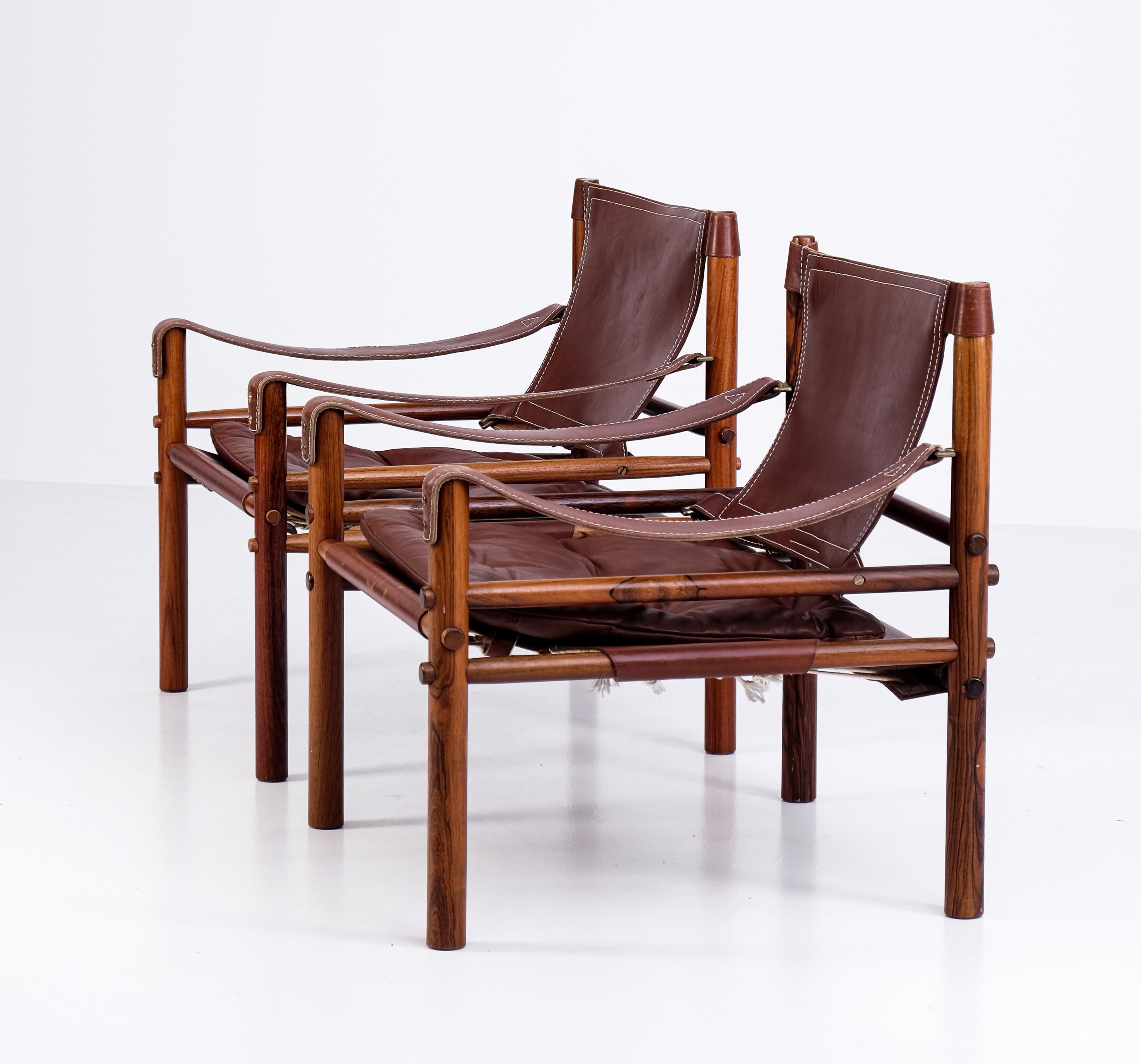 Excellent pair of safari chairs model Sirocco in good condition with original brown leather.
Designed by Arne Norell, produced by Arne Norell AB in Aneby, Sweden, 1970s.
  




