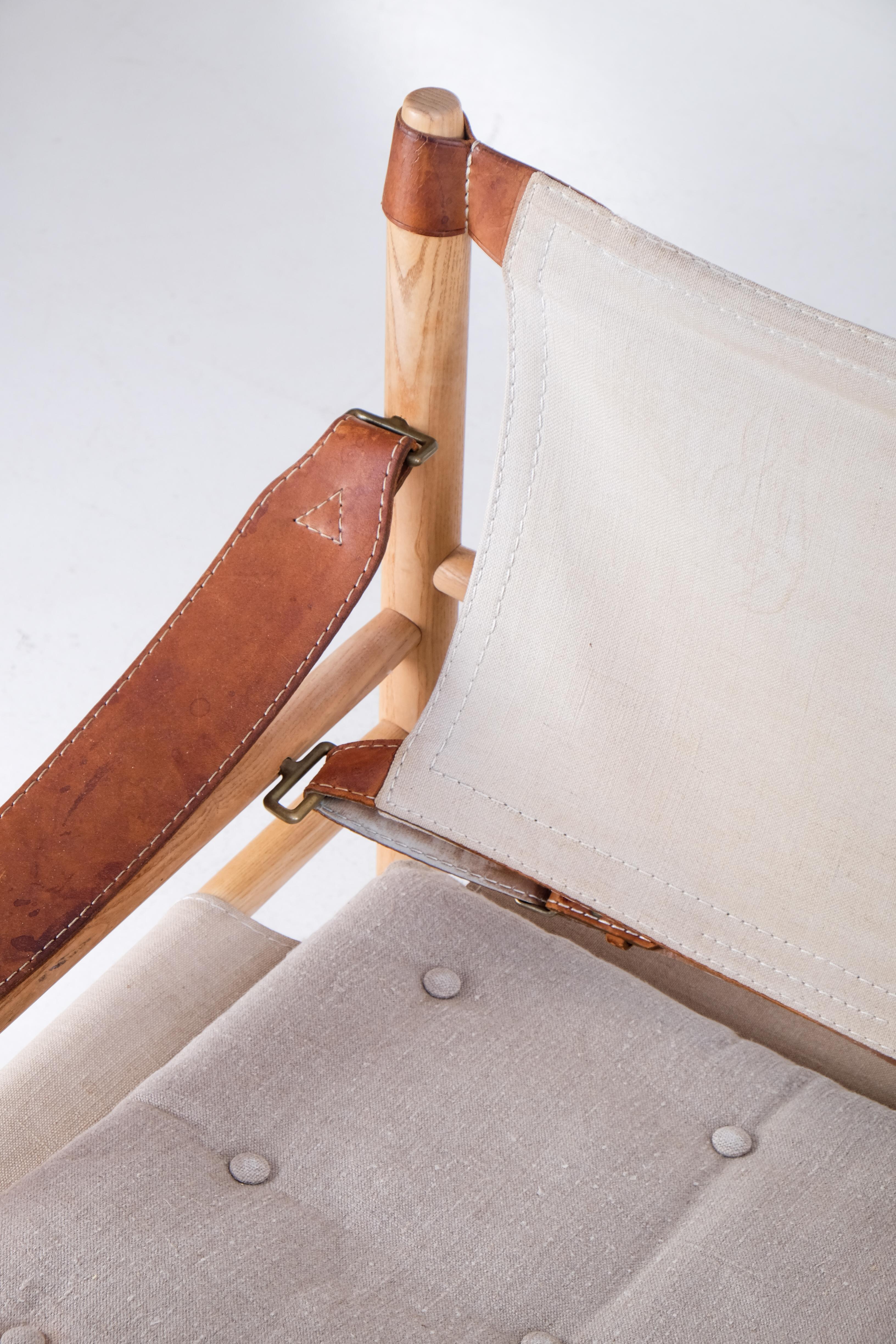Excellente paire de chaises de safari modèle Sirocco en bon état avec des coussins d'assise neufs. 
Conçu par Arne Norell, produit par Arne Norell AB à Aneby, Suède, années 1970.





 