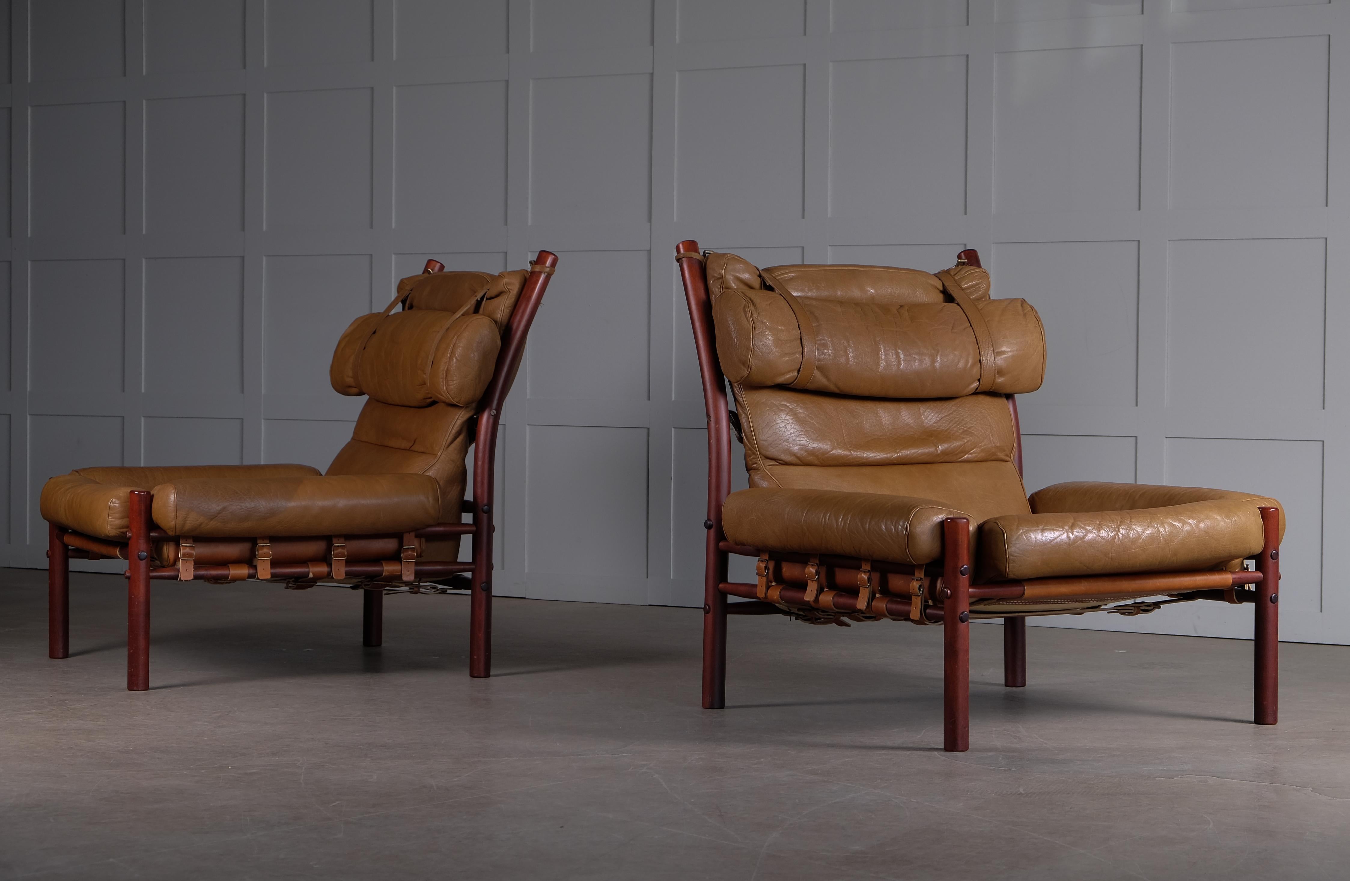 A pair of the very comfortable Inca chair with patinated original leather. Designed by Arne Norell, produced by Norell Möbel AB in Aneby, Sweden.







 