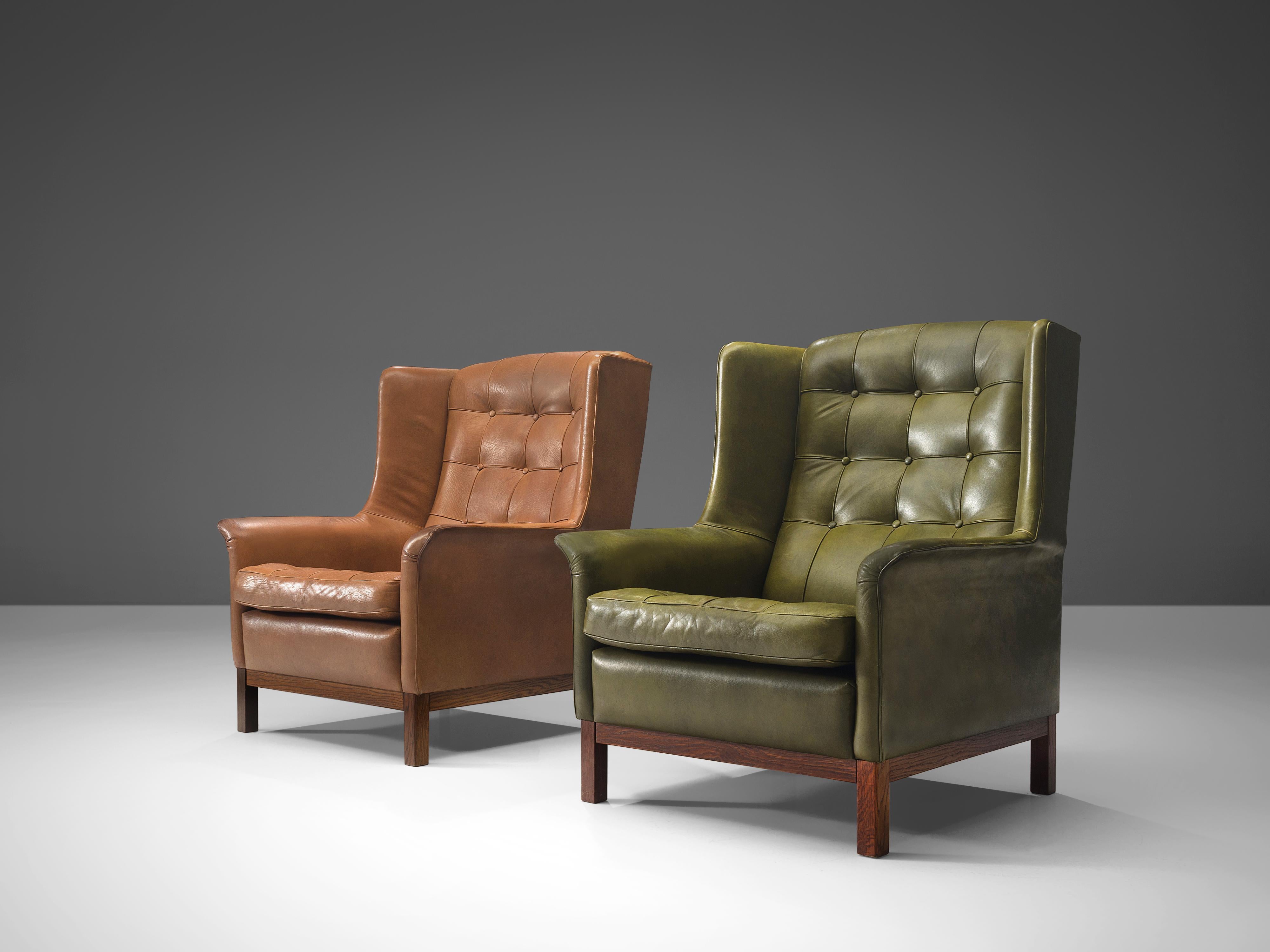 Danish Pair of Arne Norell Lounge Chairs in Patinated Green and Cognac Leather