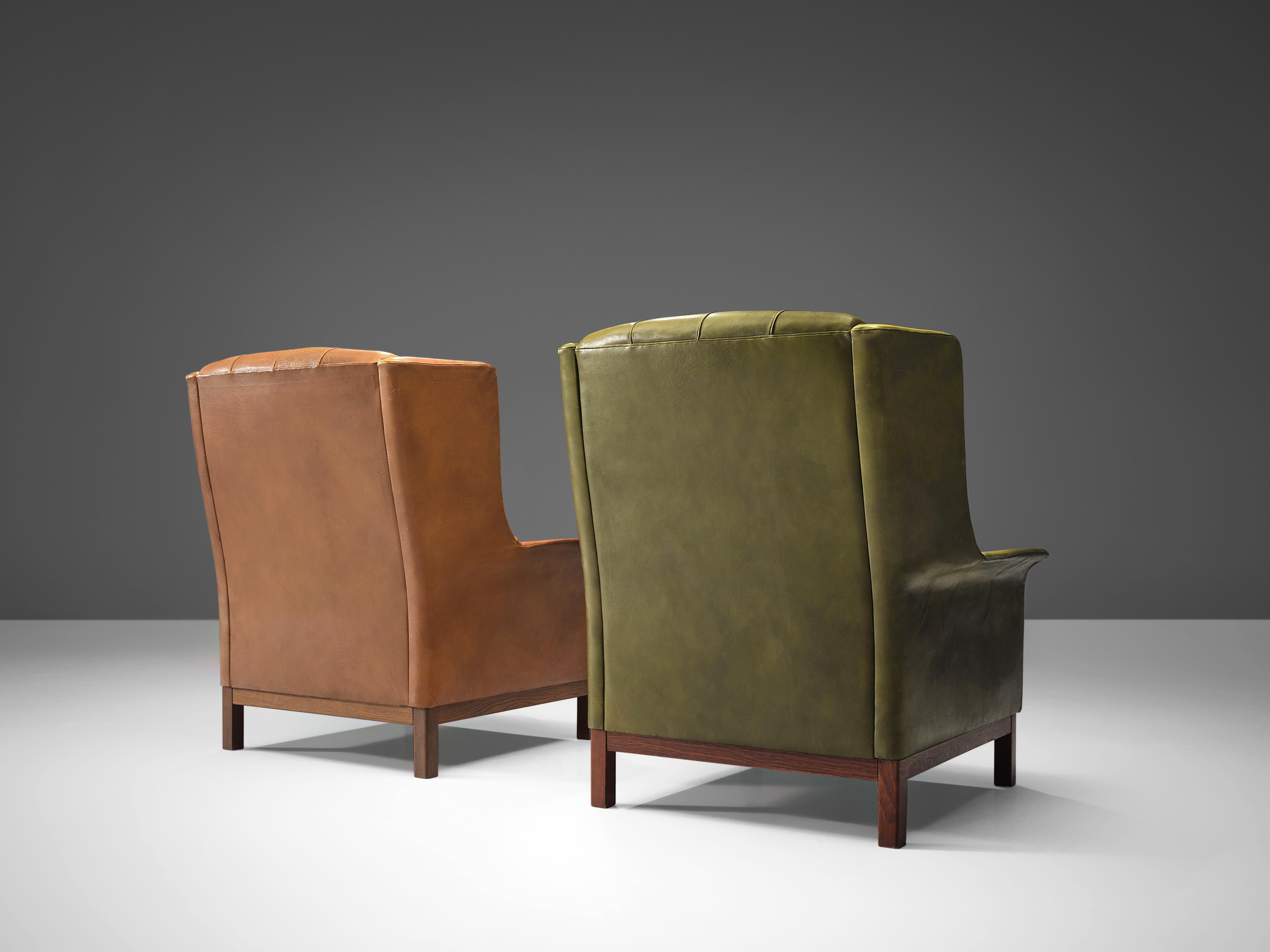 Mid-20th Century Pair of Arne Norell Lounge Chairs in Patinated Green and Cognac Leather