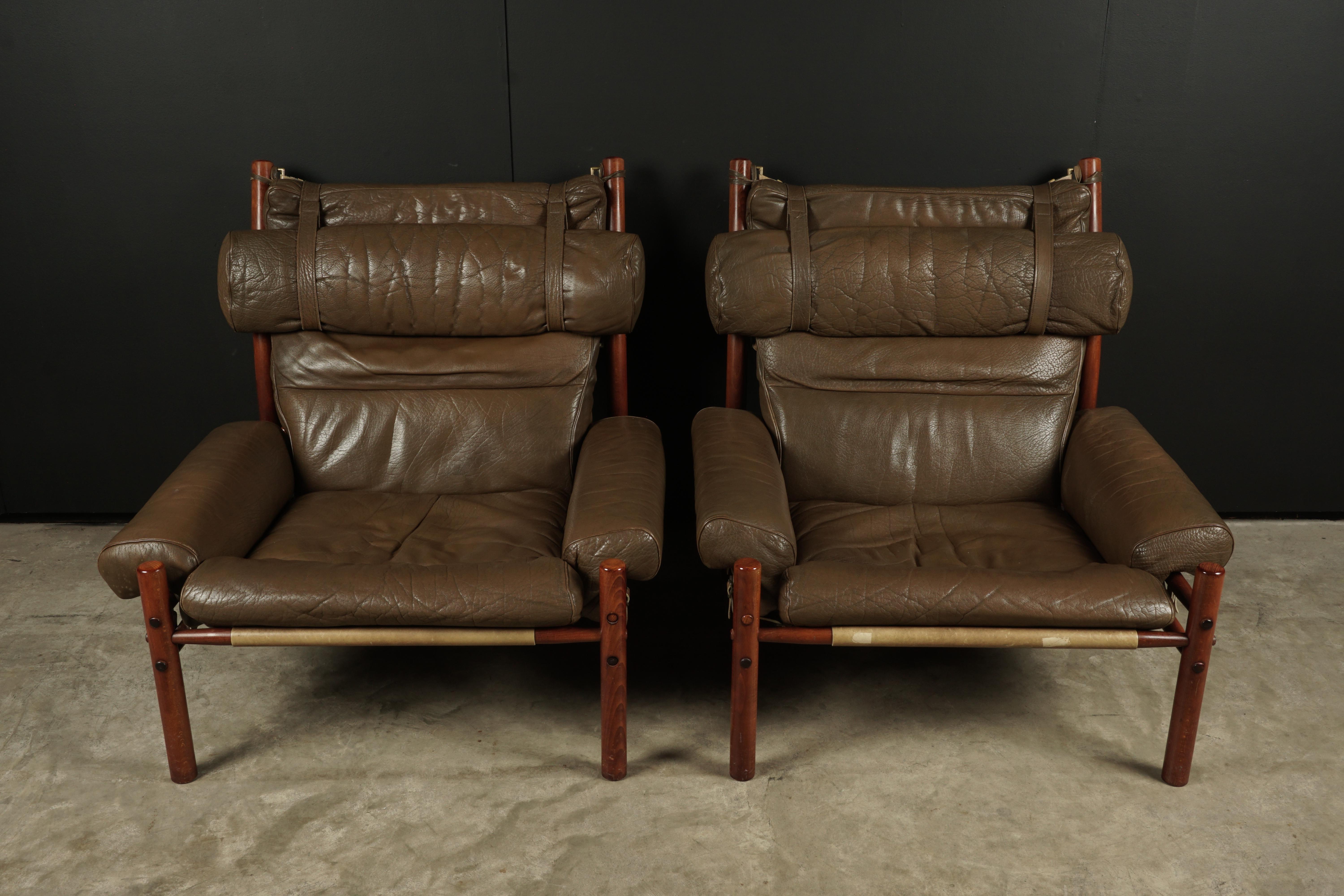 Pair of Arne Norell lounge chairs, model Inca, circa 1960. Original brown leather on a solid birch frame. Produced by Arne Norell AB, Aneby Sweden.