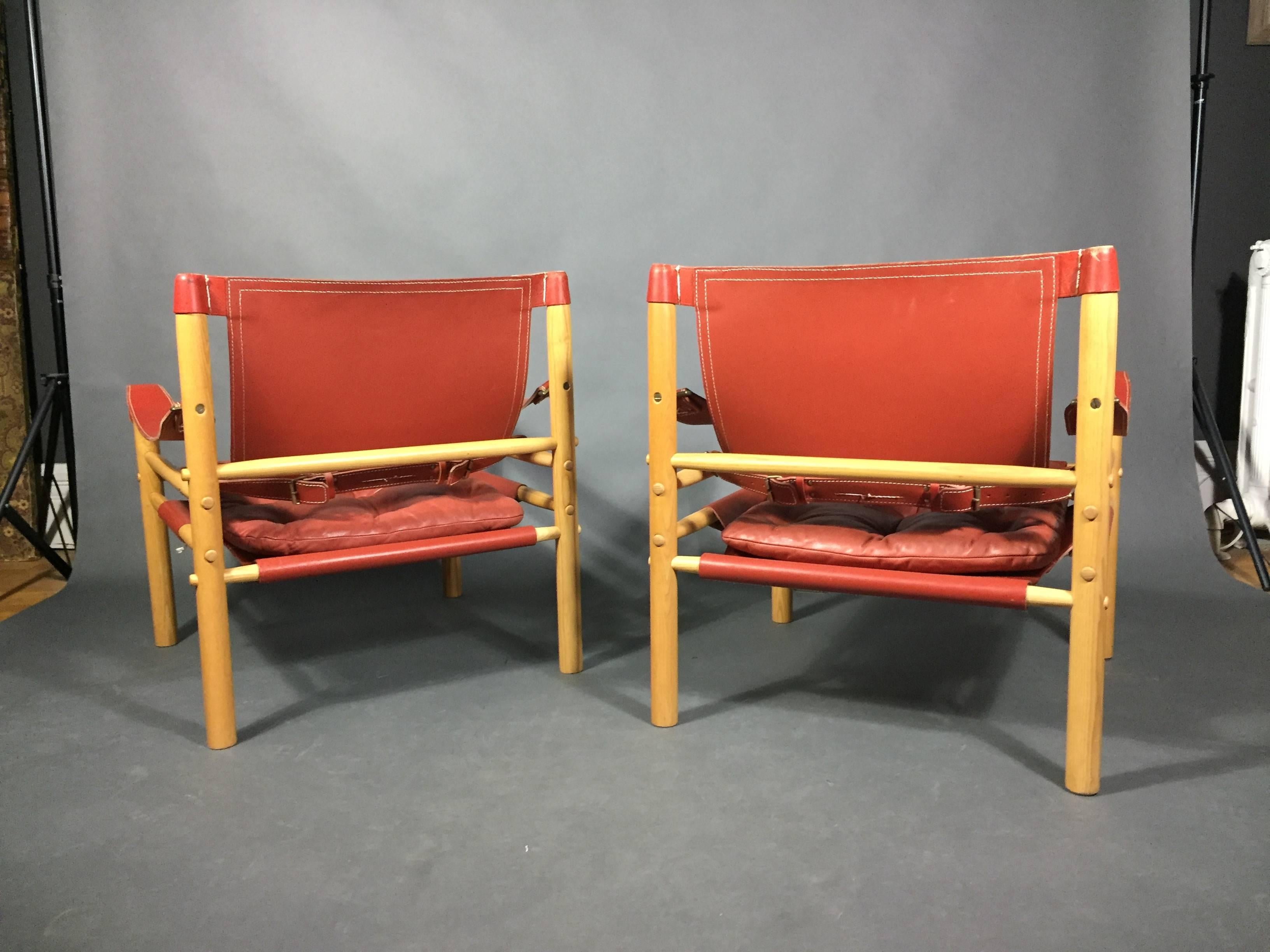 Pair of Arne Norell Red or Orange Leather Sirocco Chairs, Sweden In Excellent Condition For Sale In Hudson, NY