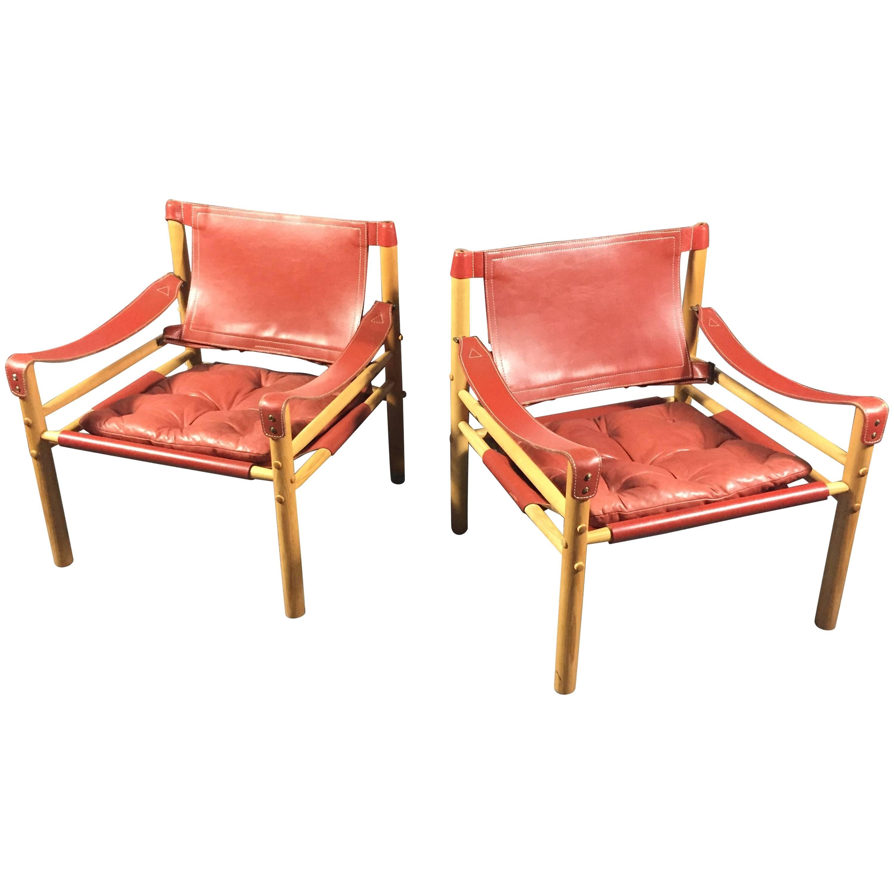 Pair of Arne Norell Red or Orange Leather Sirocco Chairs, Sweden For Sale