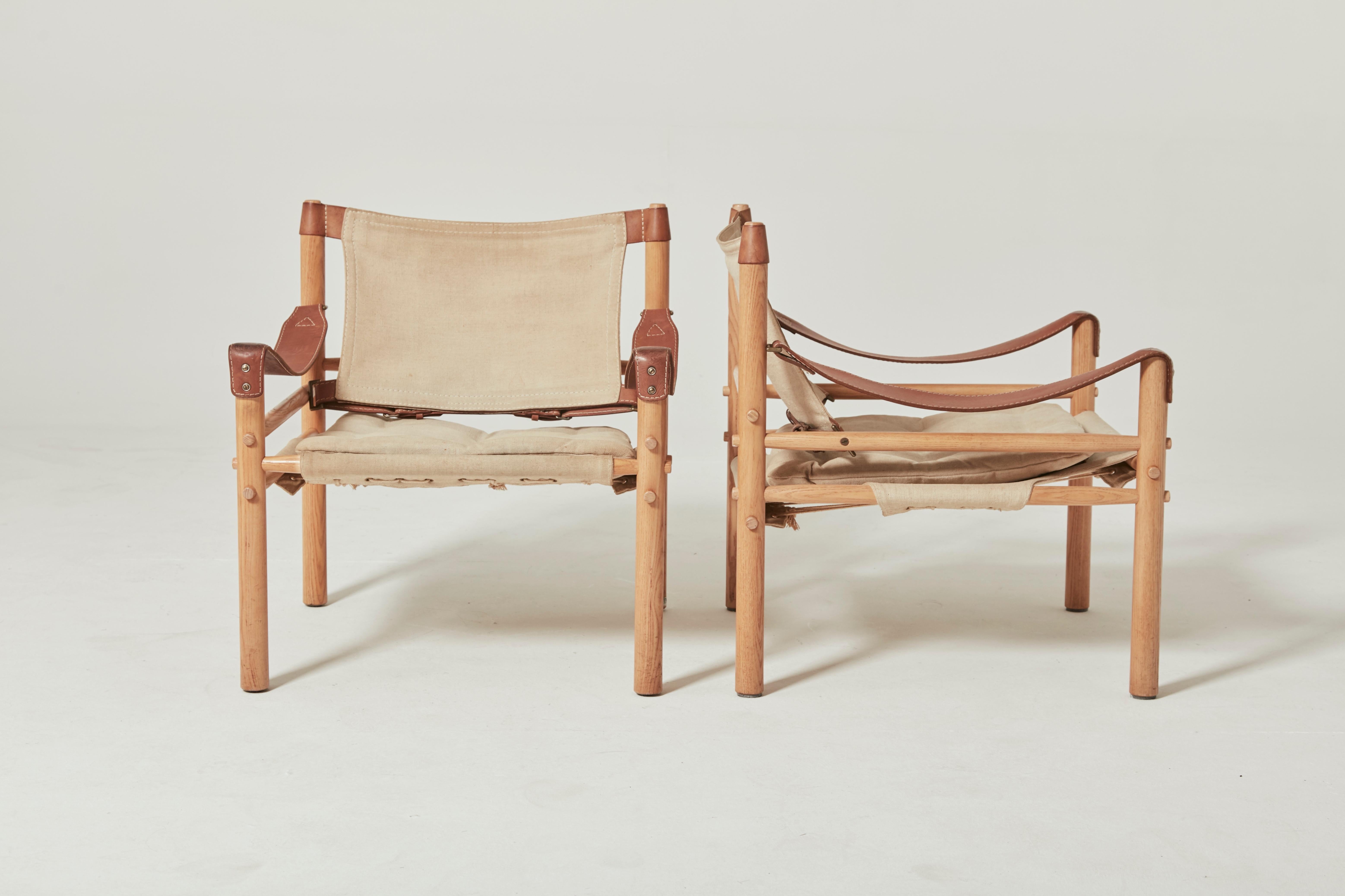 A pair of beautiful Arne Norell safari sirocco chairs in ashwood and canvas. Made by Norell Möbel AB, in Sweden with makers labels intact. Good vintage condition.


These chairs will be shipped assembled.