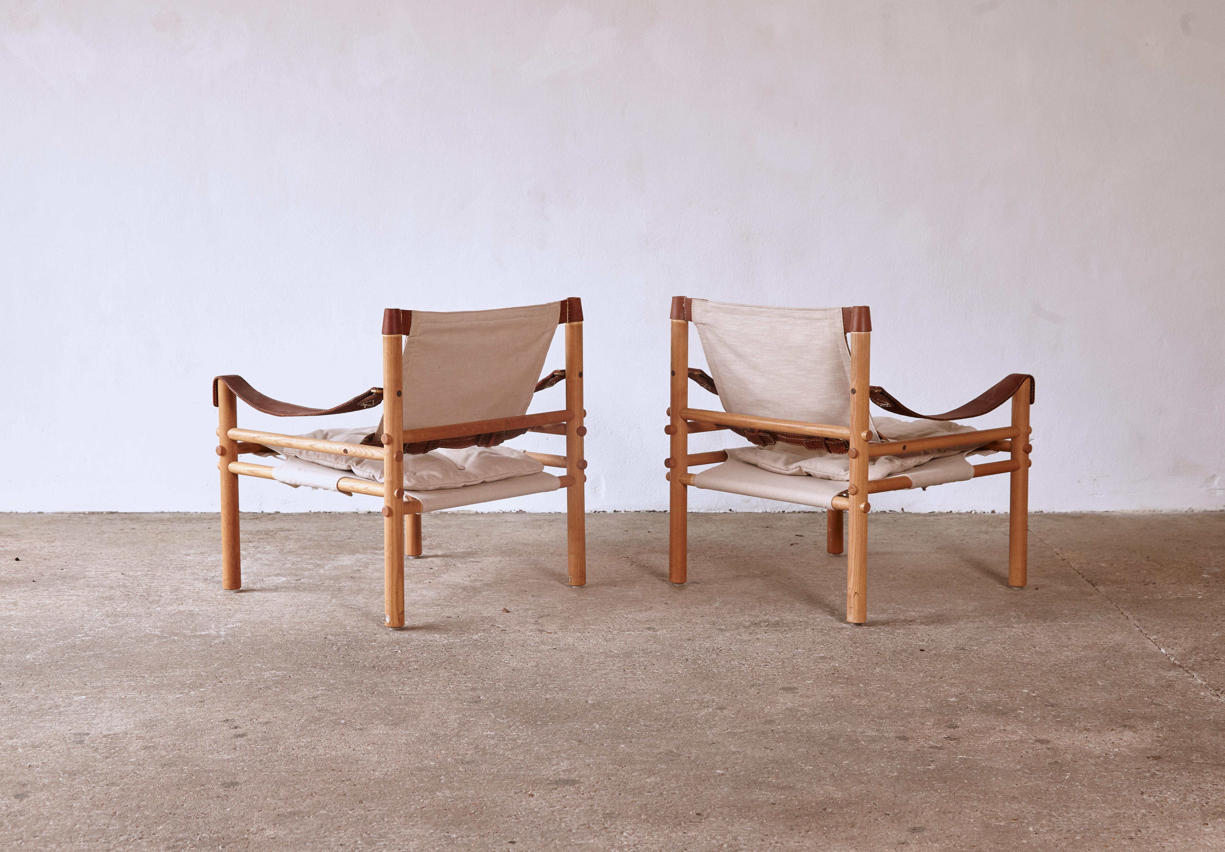 Brass Pair of Arne Norell Safari Sirocco Lounge Chairs, Norell Mobel, Sweden, 1970s