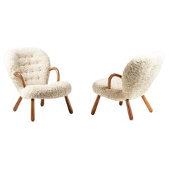 Pair of Arnold Madsen Sheepskin Clam Chairs