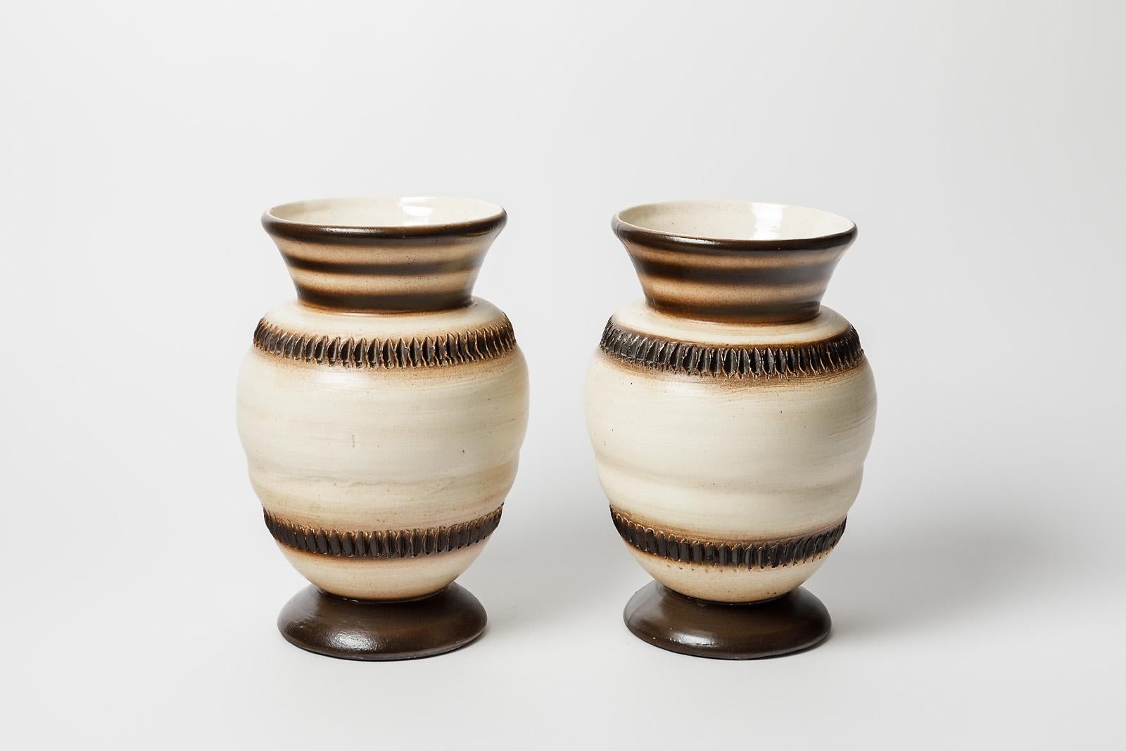 Louis Dage

Pair of art deco ceramic vases by Louis Dage

White and black ceramic glazes colors

Signed

Original perfect condition

height 25 cm
Large 18 cm

