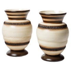 pair of art deco 1930 white and black ceramic vases by Louis Dage 