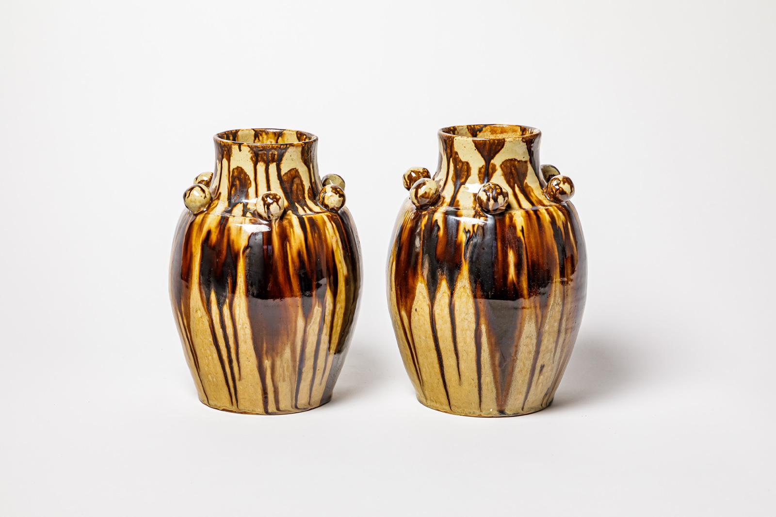 Joseph Talbot 

Large pair of art deco ceramic vases

Modernist 20th century design ceramic form

Original perfect condition

Abstract brown ceramic glazes colors

Signed under the base

Height 28 cm
Large 18 cm