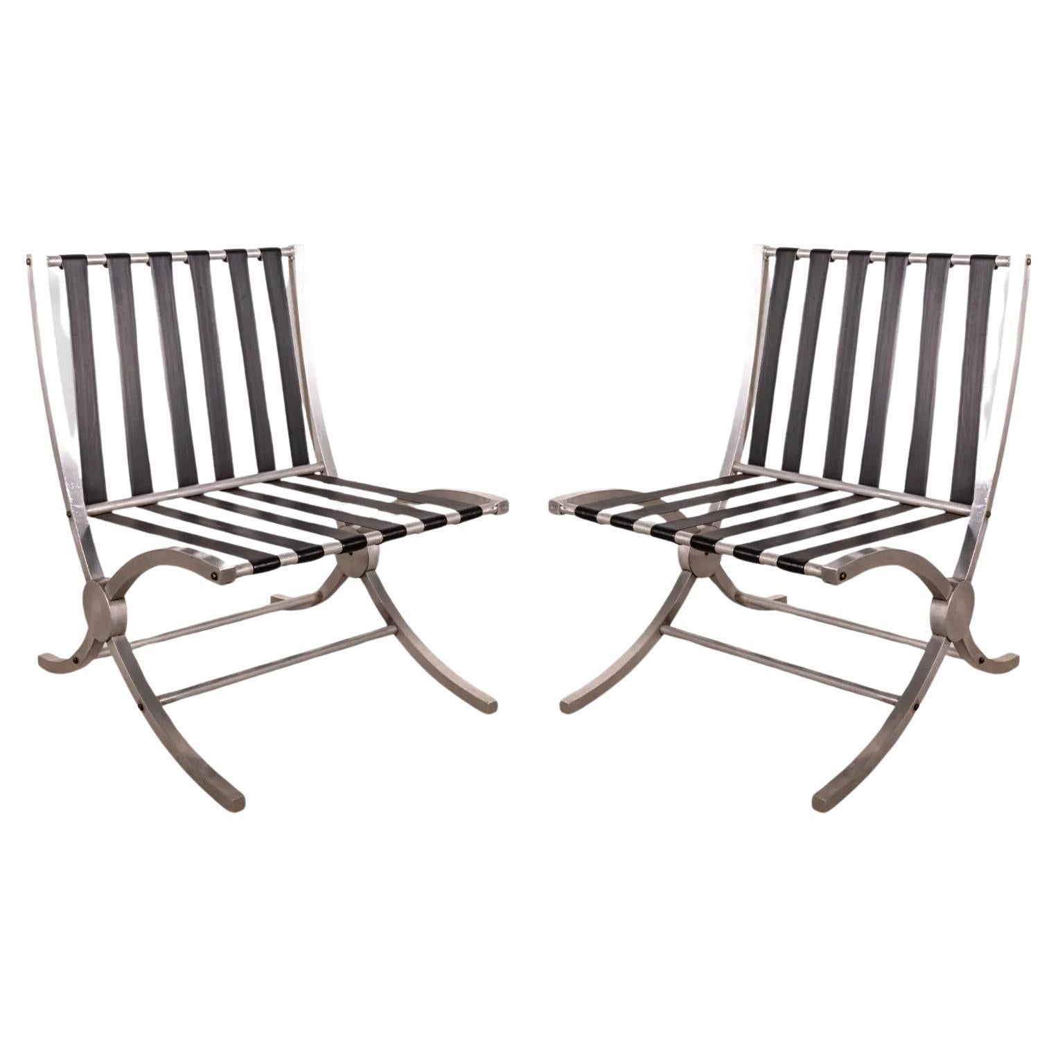 Pair of Art Deco Aluminum and Black Barcelona Style X Framed Sleek Lounge Chairs For Sale