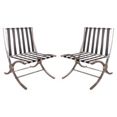 Vintage Pair of Art Deco Aluminum and Black Barcelona Style X Framed Sleek Lounge Chairs