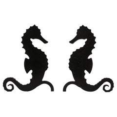 Pair of Art Deco Andirons in Patinated Black Enamel w/ Mirrored Seahorses